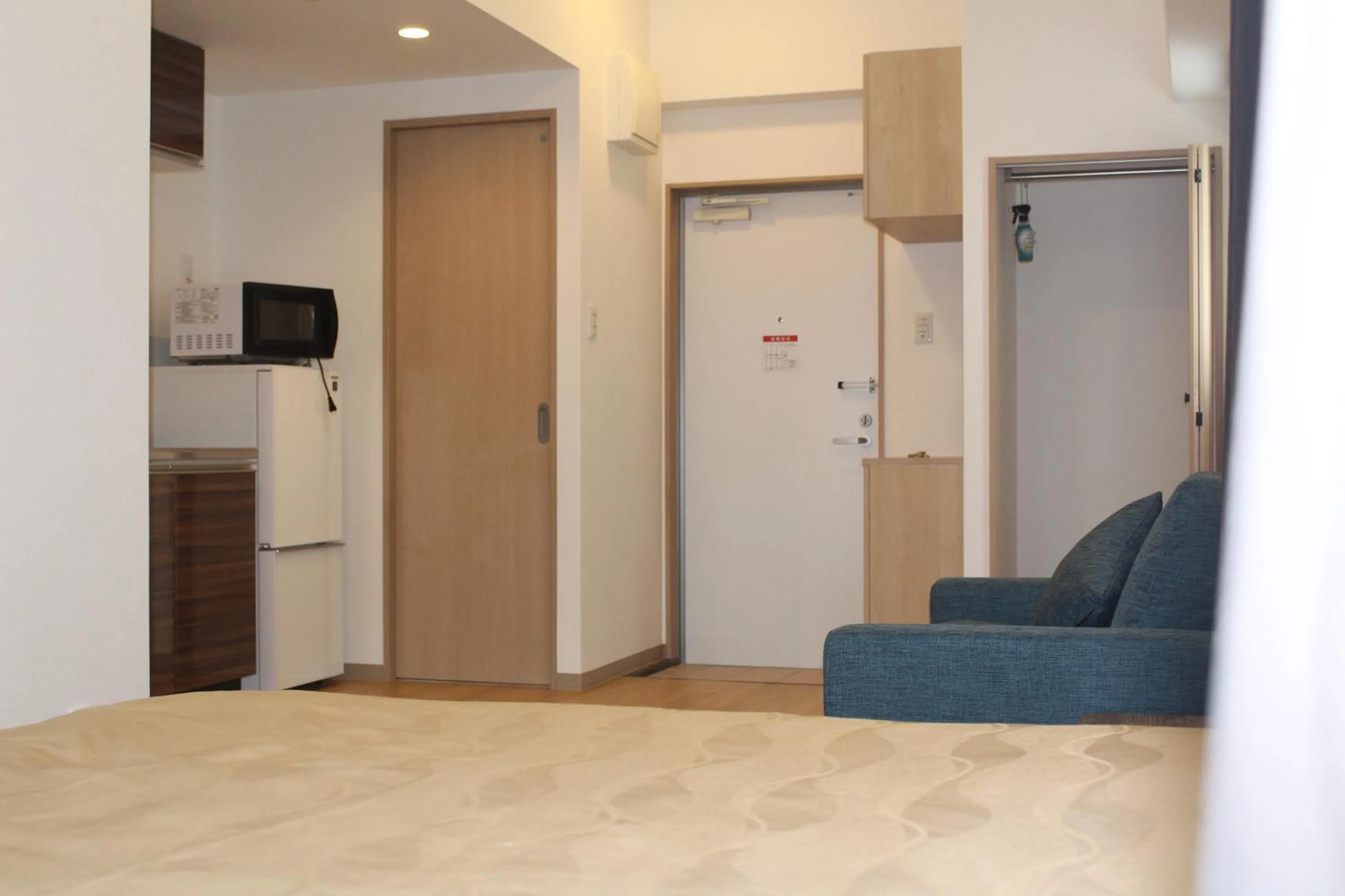 Kitchen or kitchenette in M´s Stay Okinawa