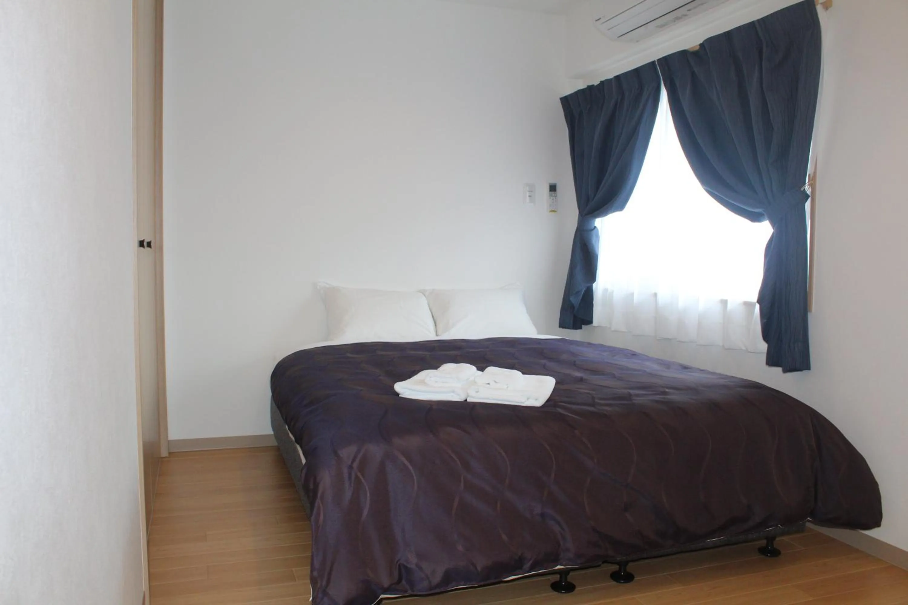 Bed in M´s Stay Okinawa