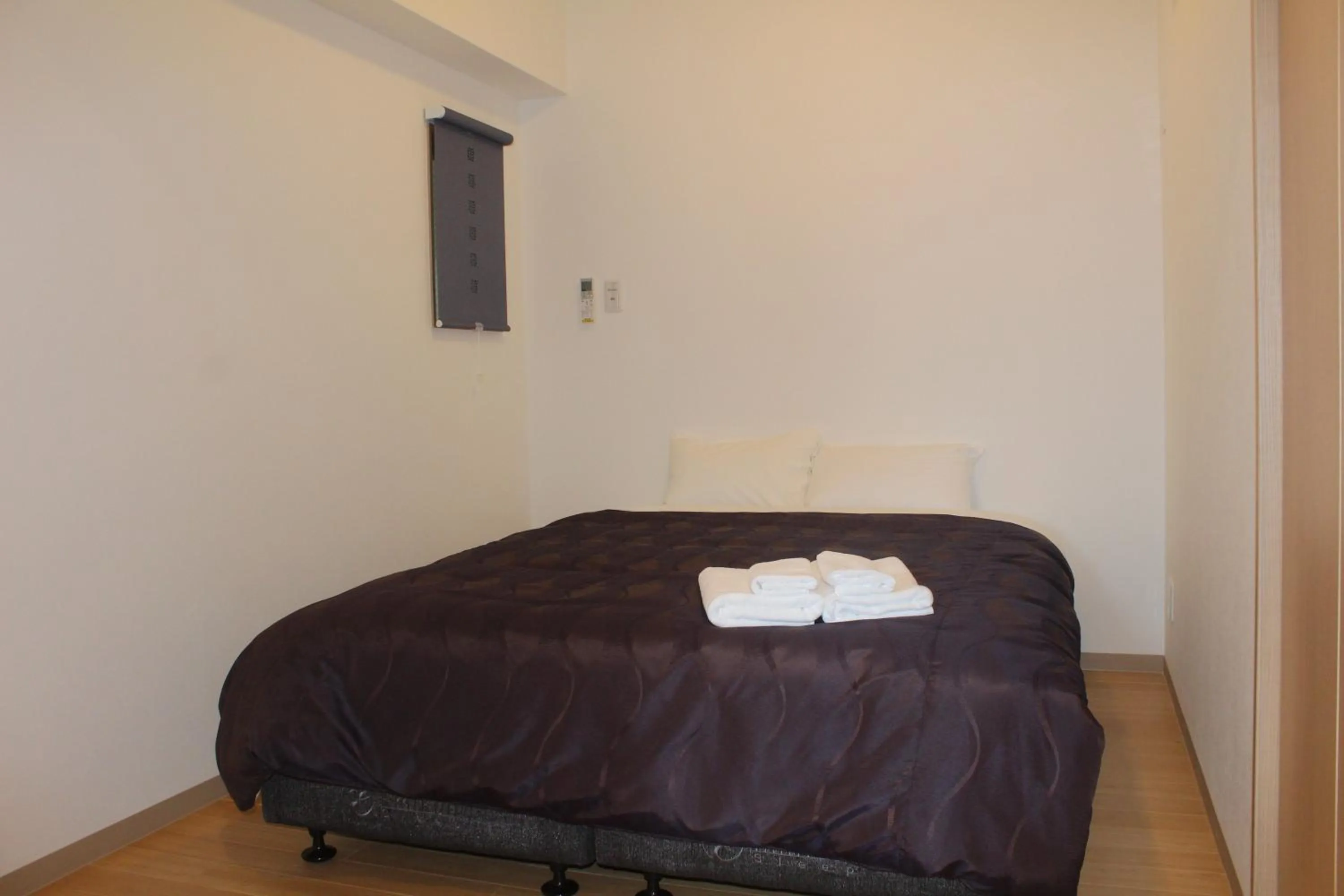 Bed in M´s Stay Okinawa