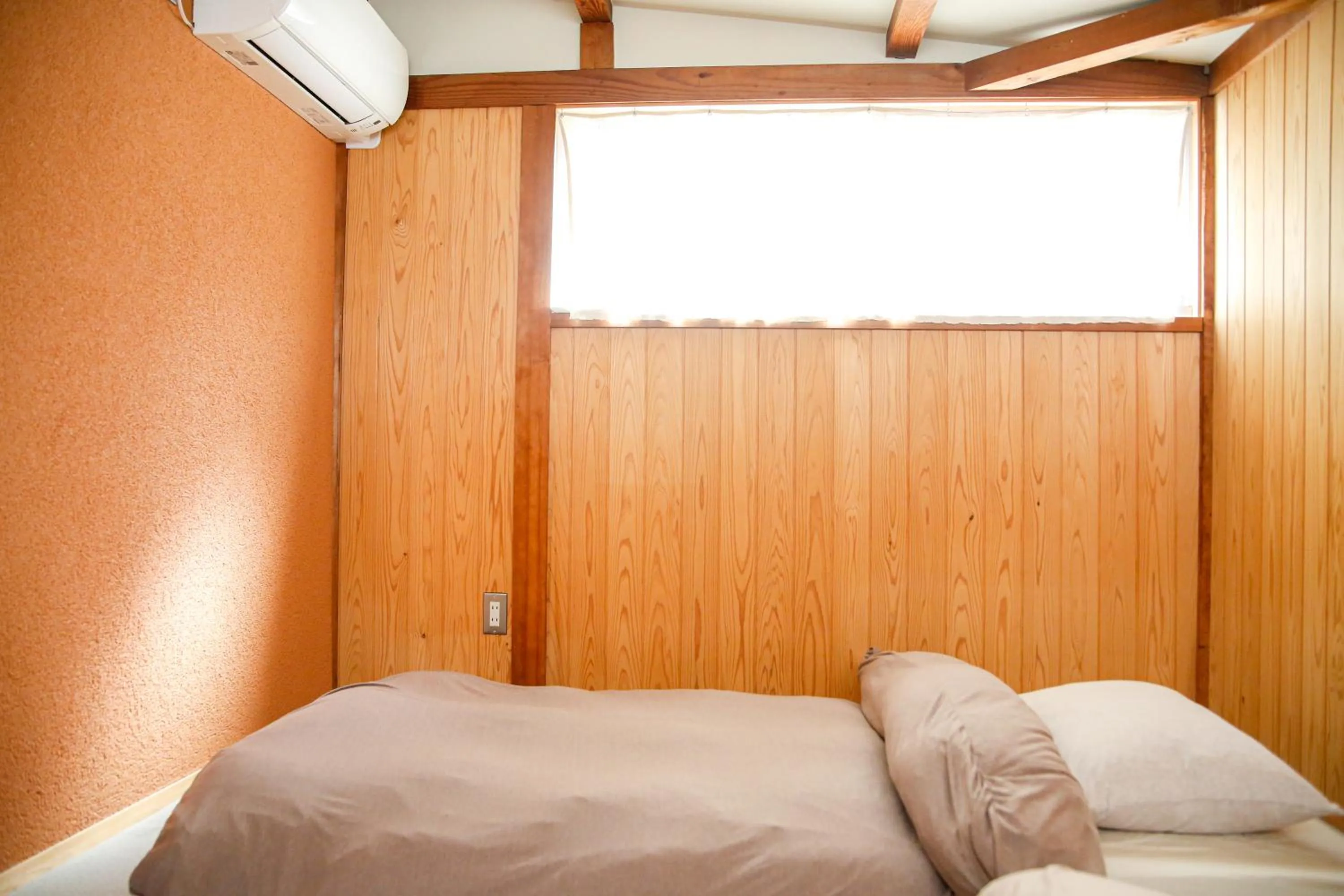 Bed in Temari Inn Oitoma