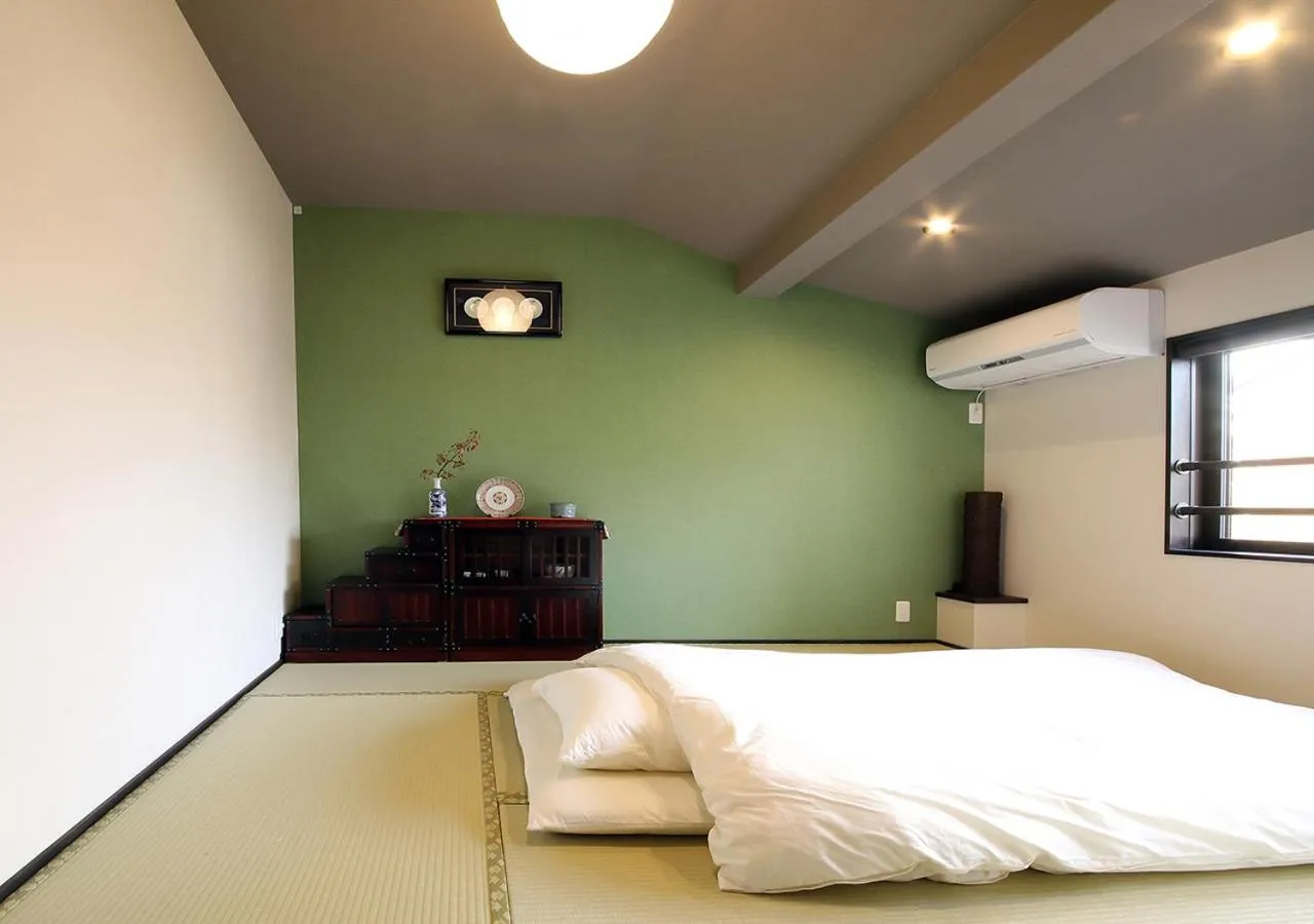 Property building, Bed in Guest House Nishijin Yui