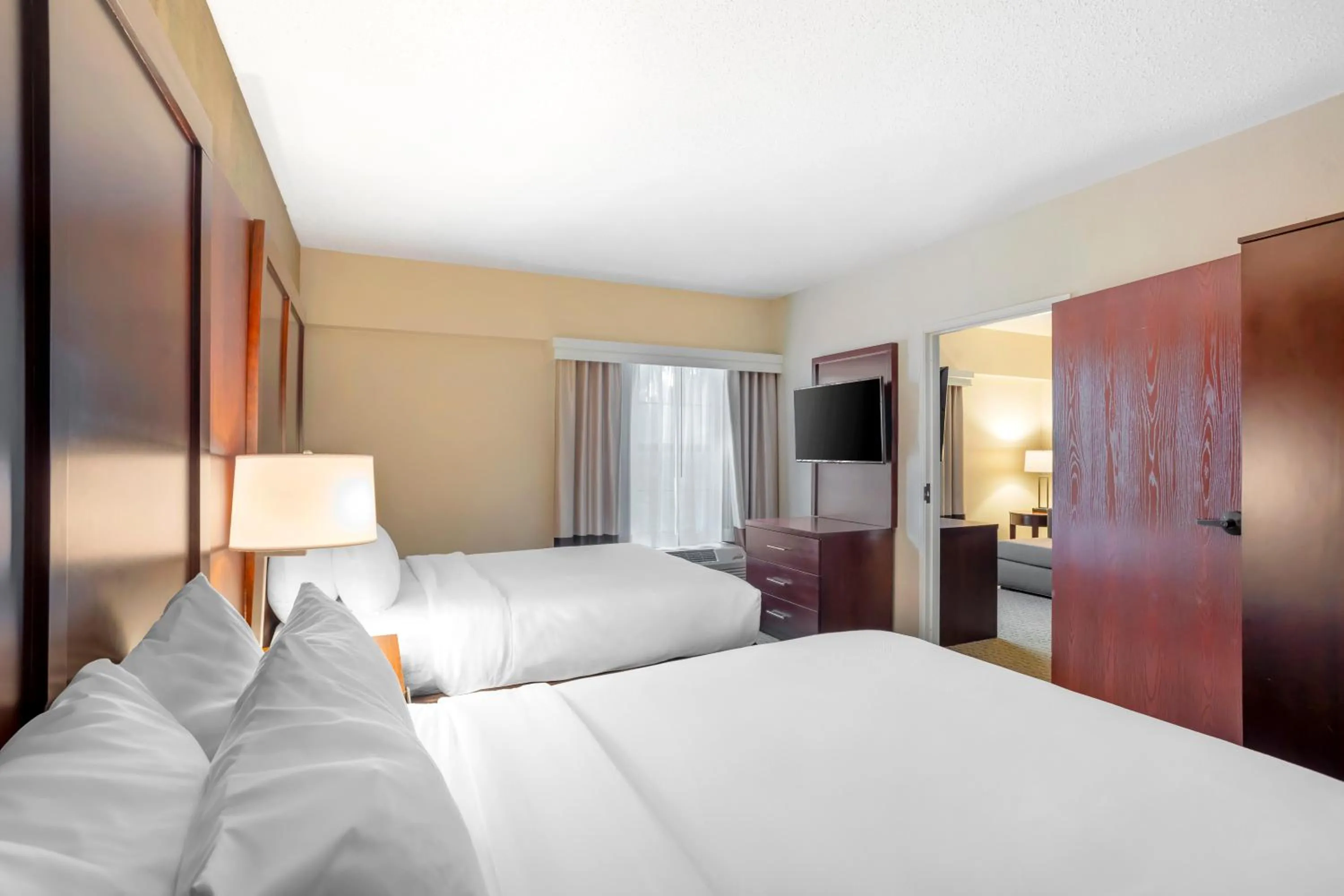 Bed in Comfort Suites State College near Penn State - Steps Away from PSU!