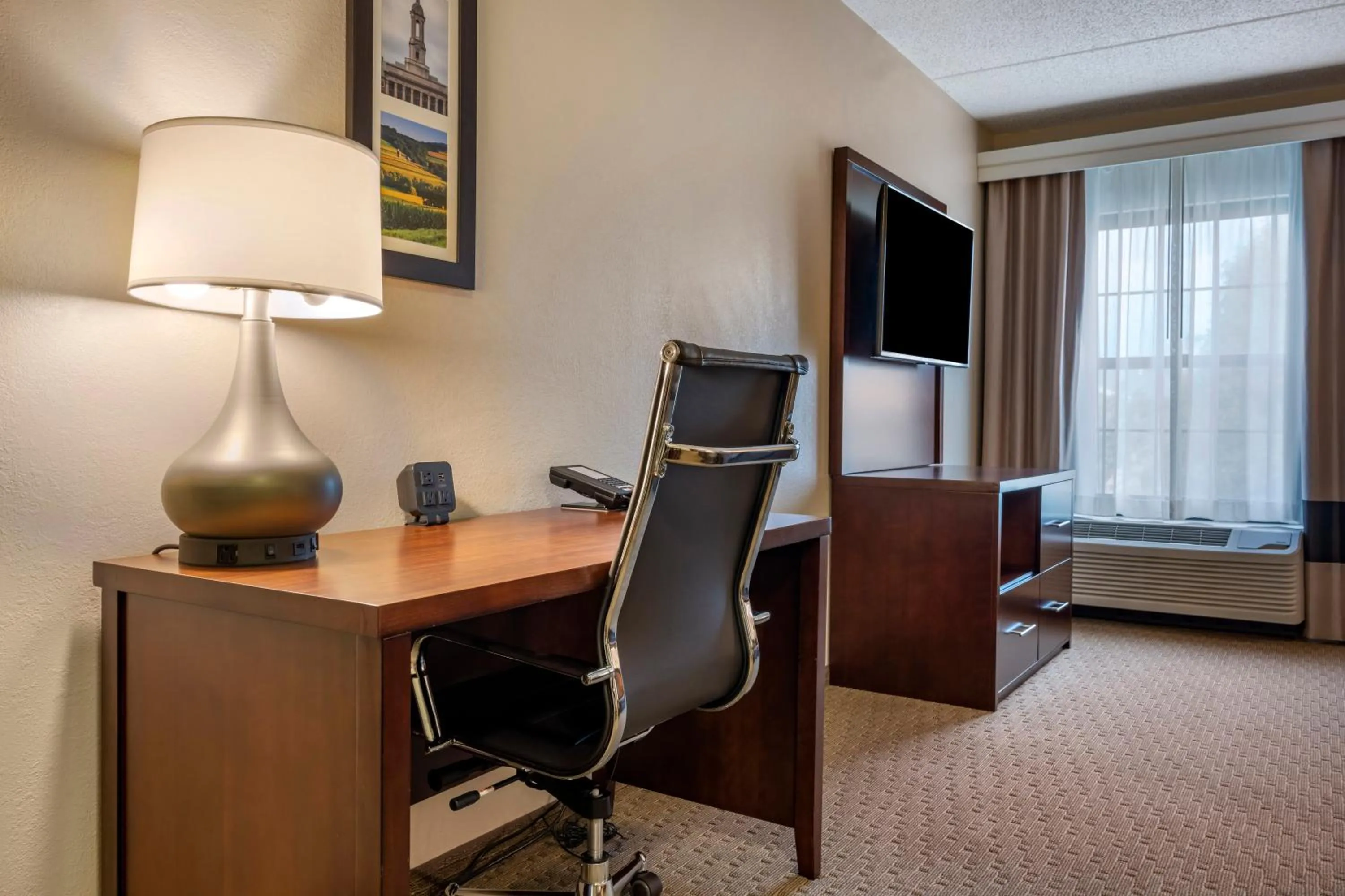 Living room in Comfort Suites State College near Penn State - Steps Away from PSU!