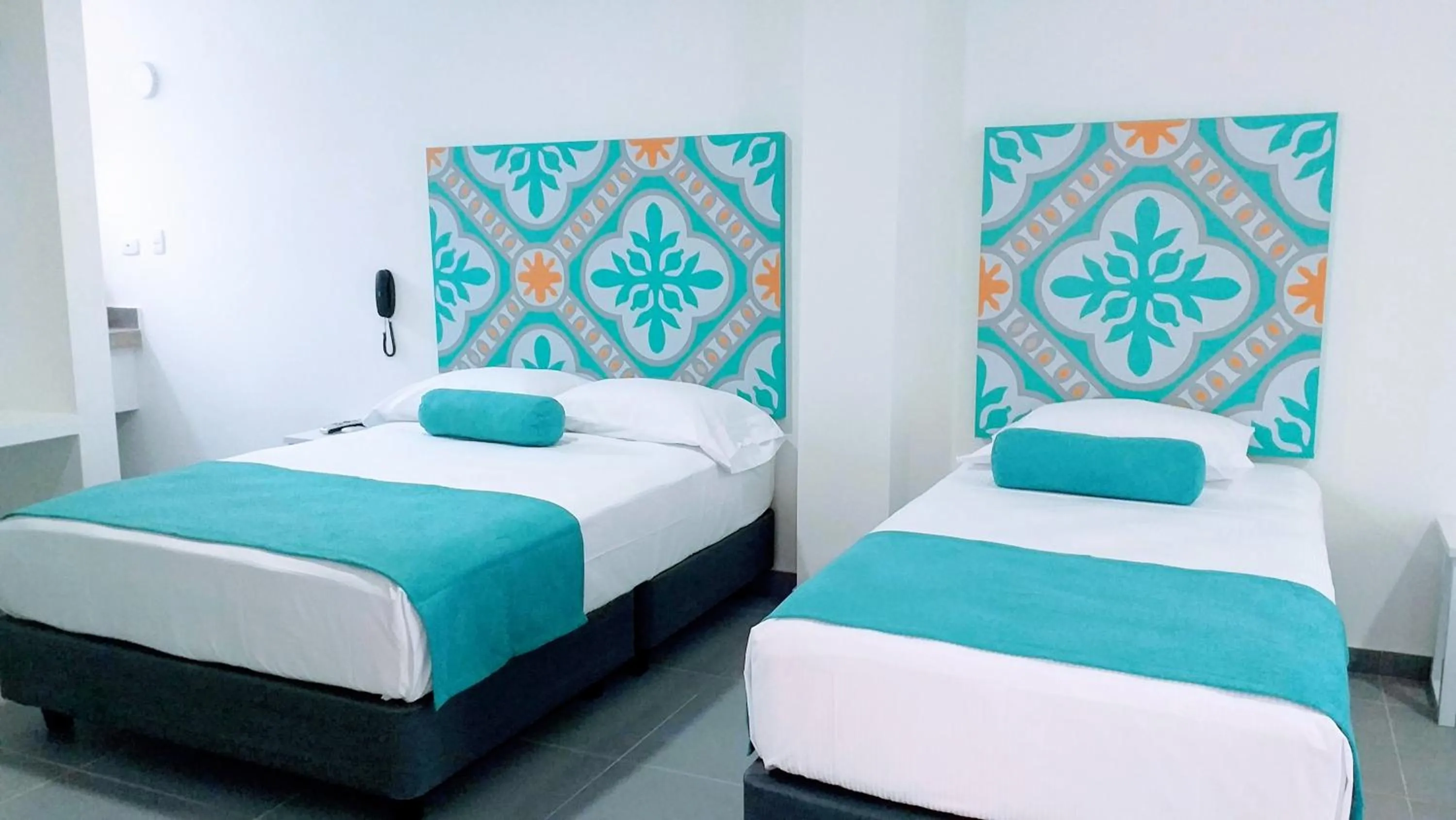 Bed in Akuamarina Hotel