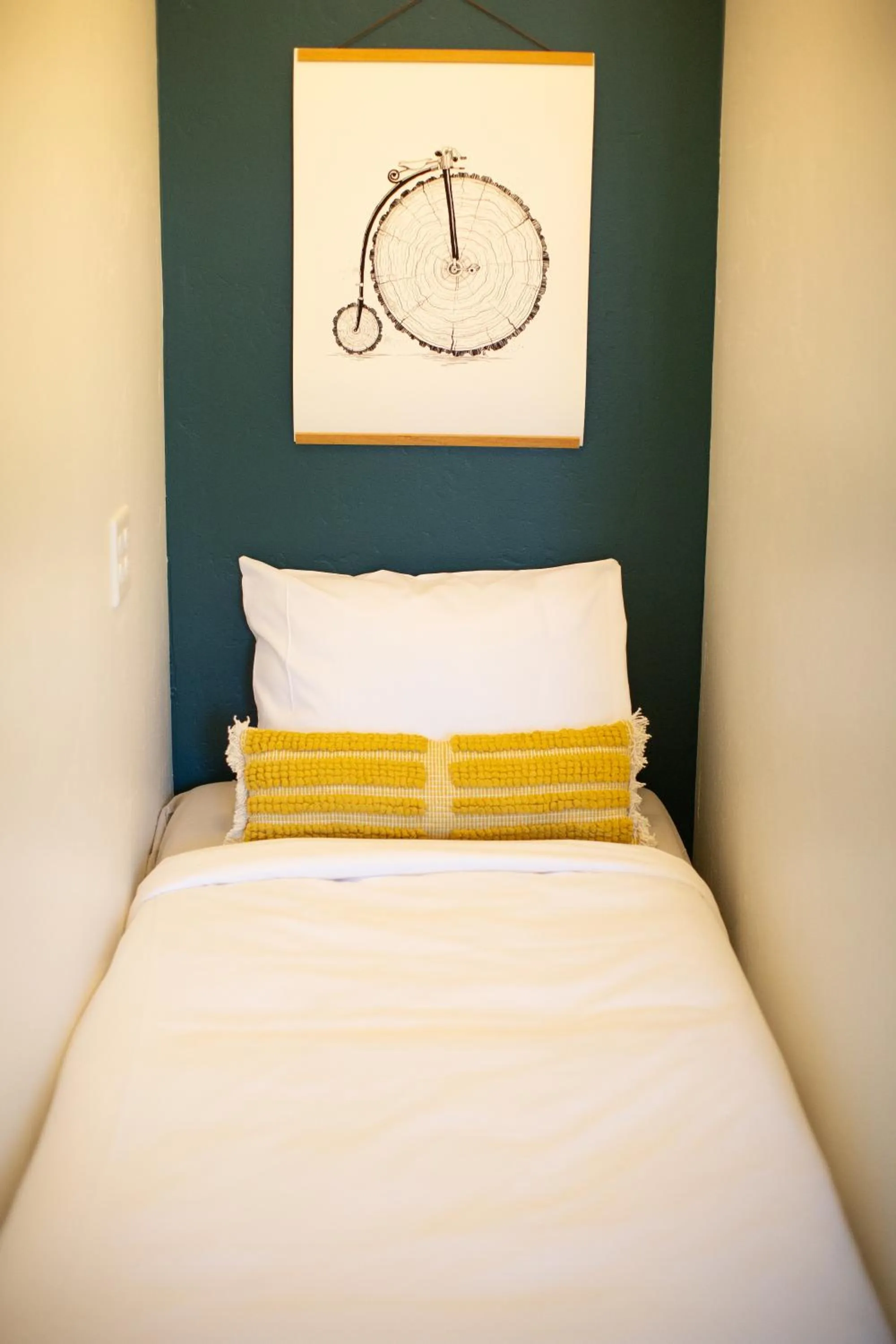 Bed in Spoke and Vine Motel