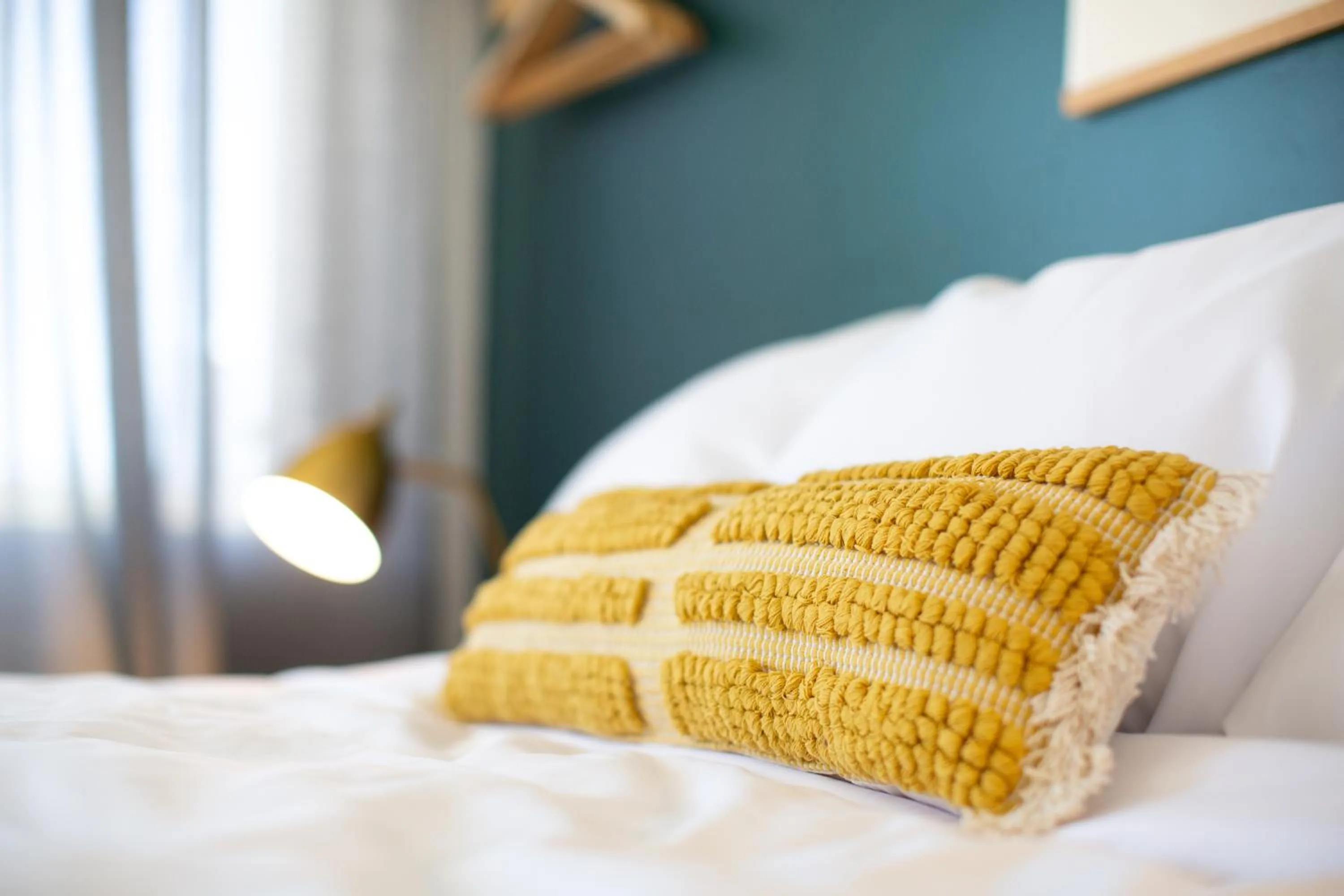 Bed in Spoke and Vine Motel