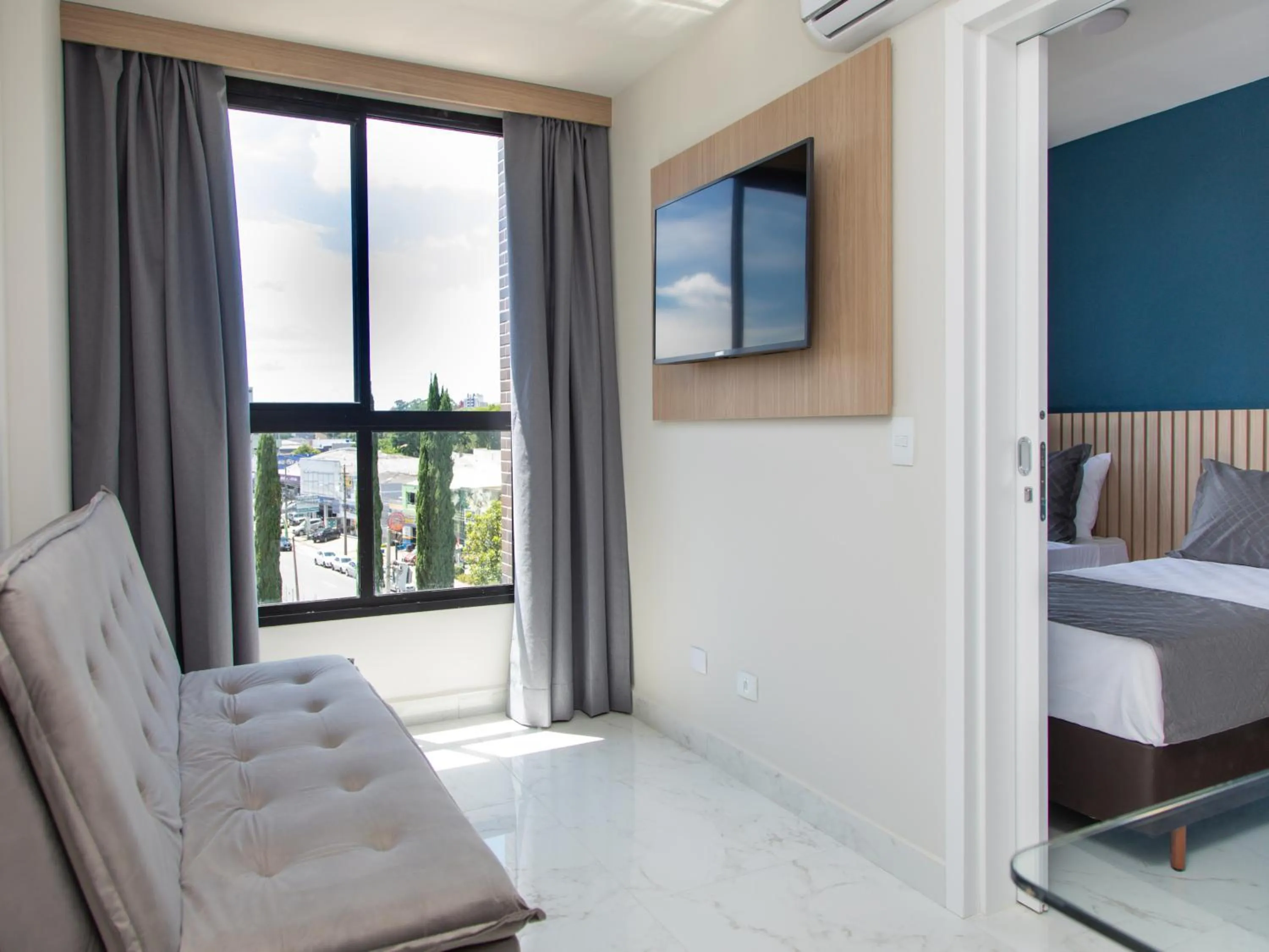 Living room, Bed in Slim Curitiba João Bettega