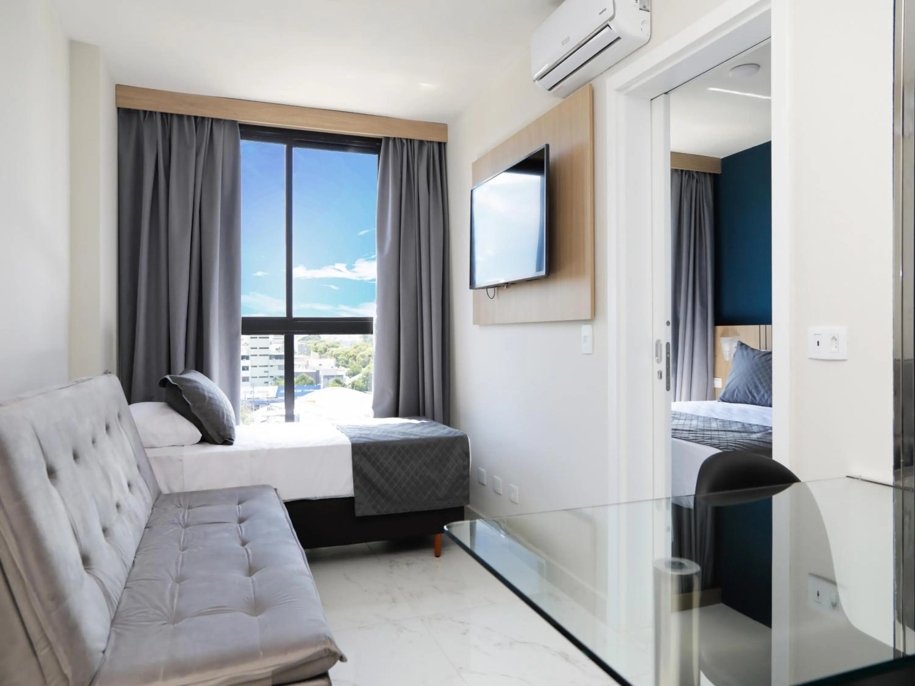 Living room, Bed in Slim Curitiba João Bettega