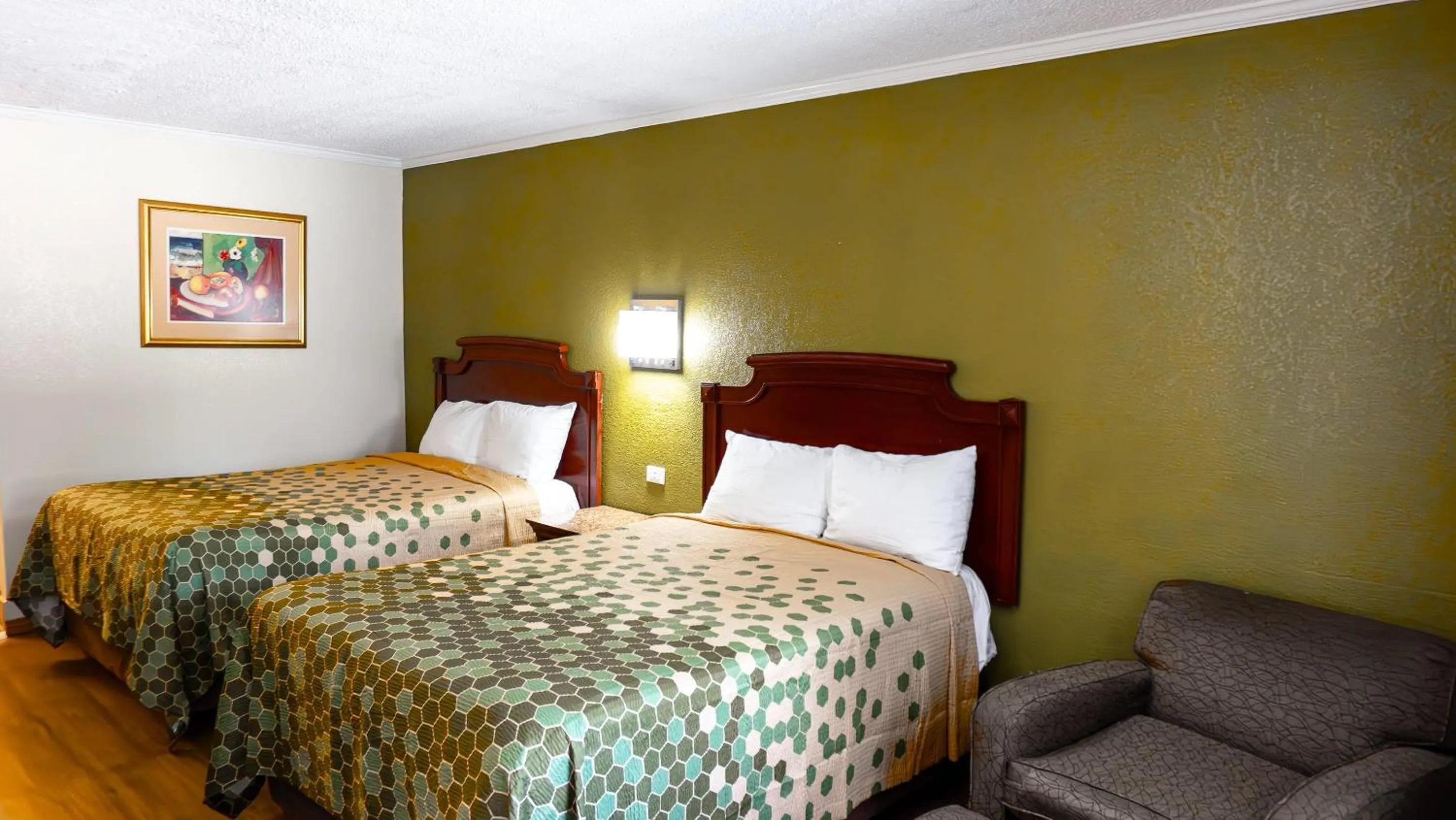 Bedroom, Bed in Rodeway Inn & Suites Fort Jackson