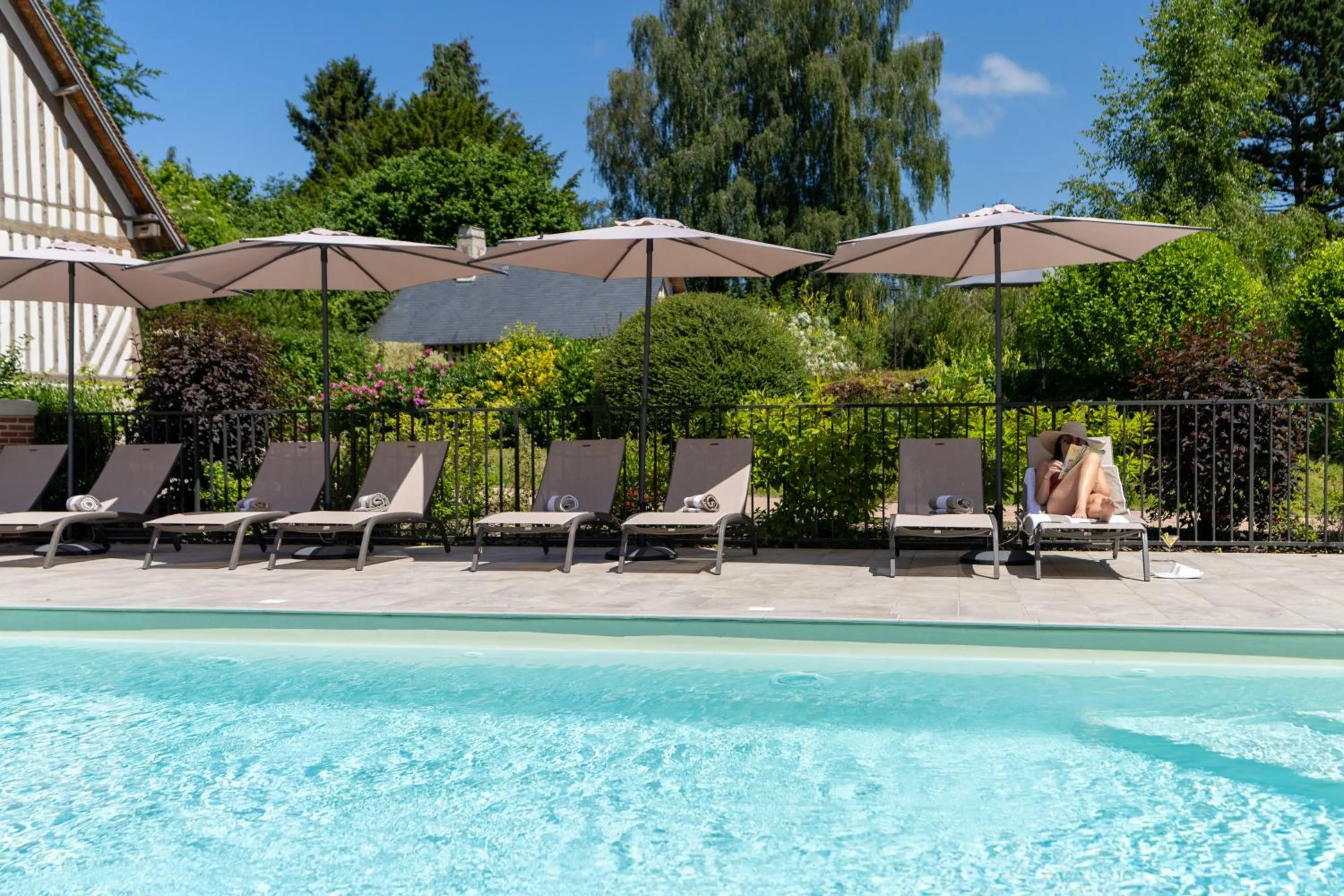 Swimming pool in Les Manoirs des Portes de Deauville - Small Luxury Hotel Of The World