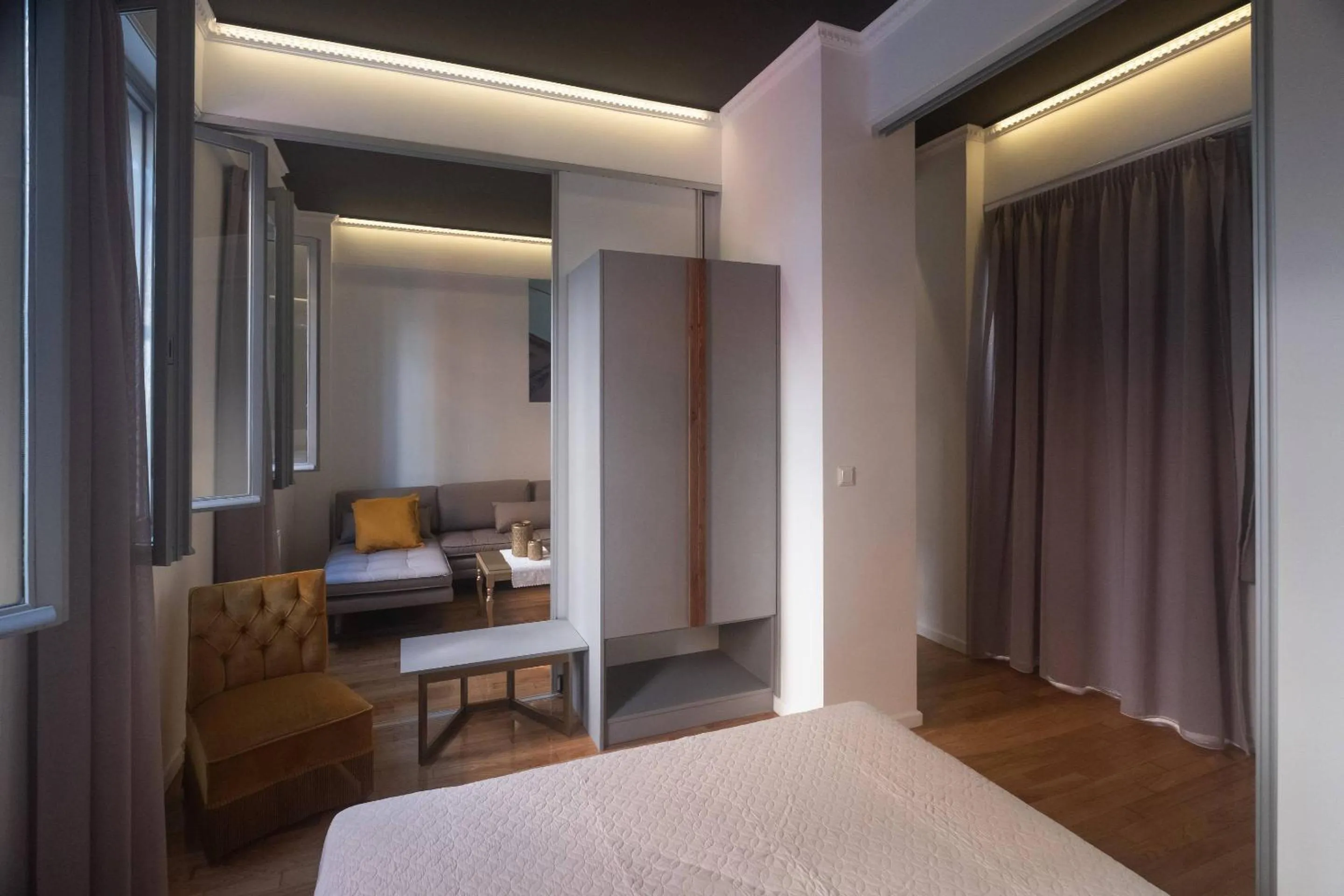 Bed in ATHENIAN YARD SUITES