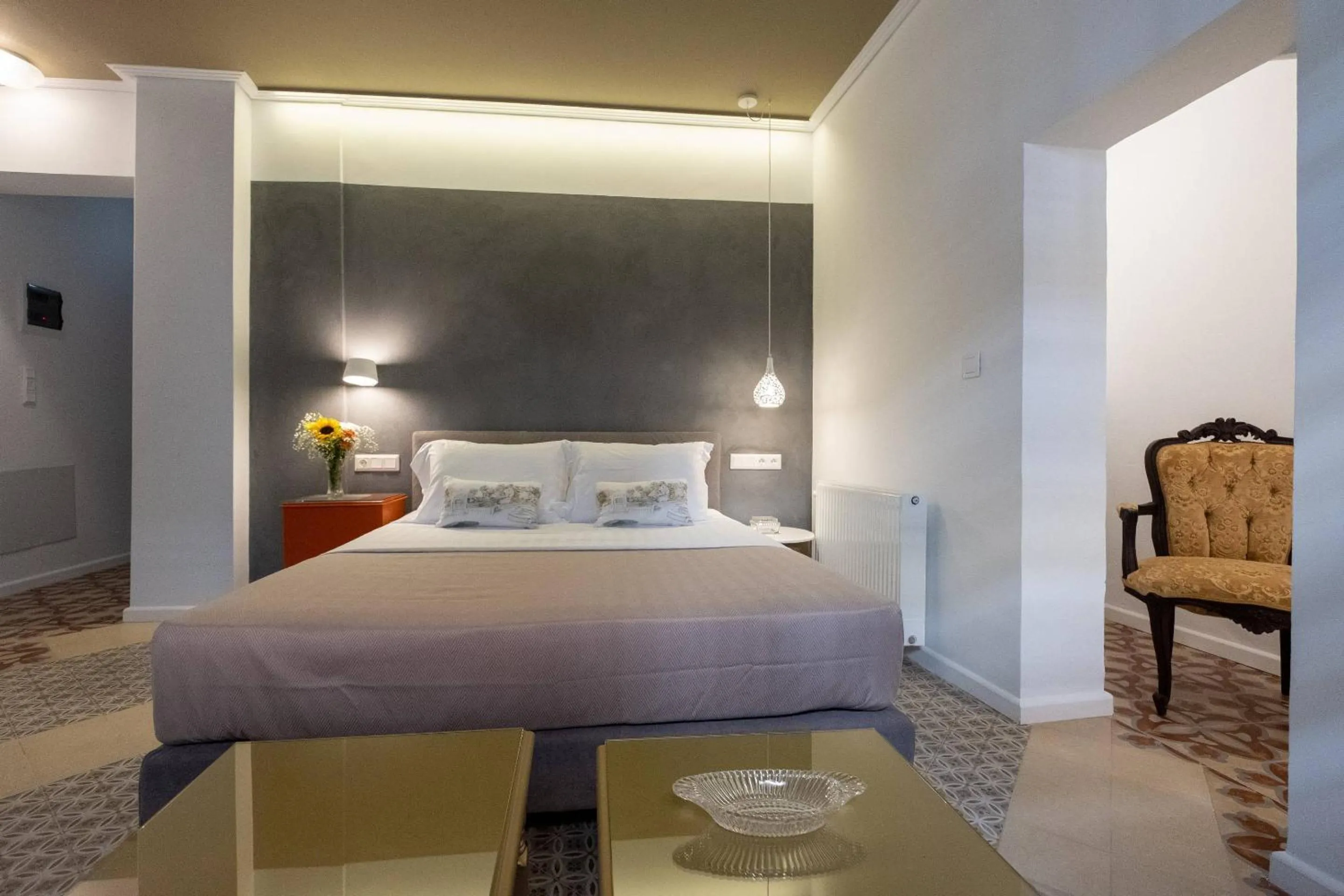 Bed in ATHENIAN YARD SUITES