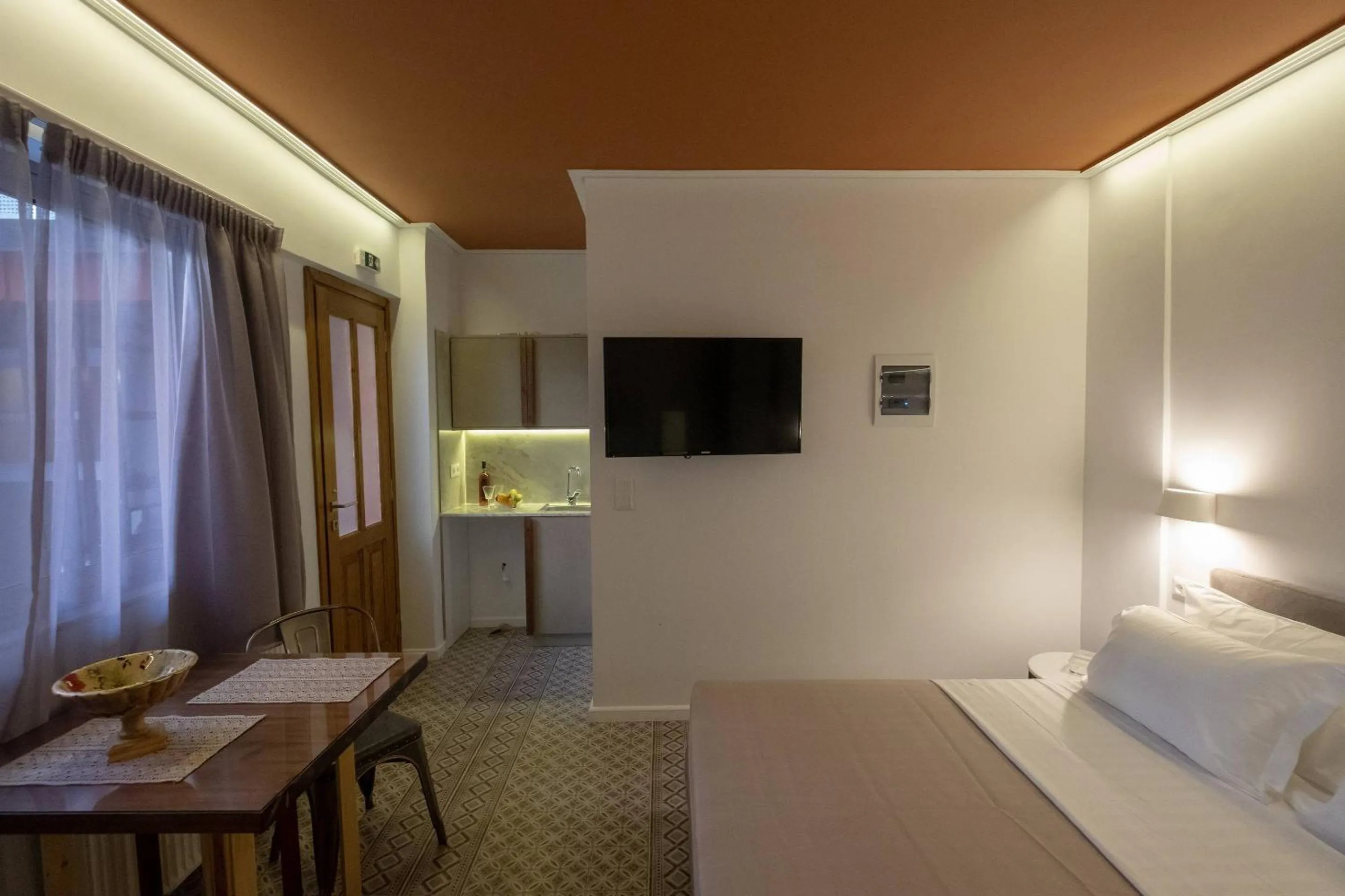 Bed in ATHENIAN YARD SUITES