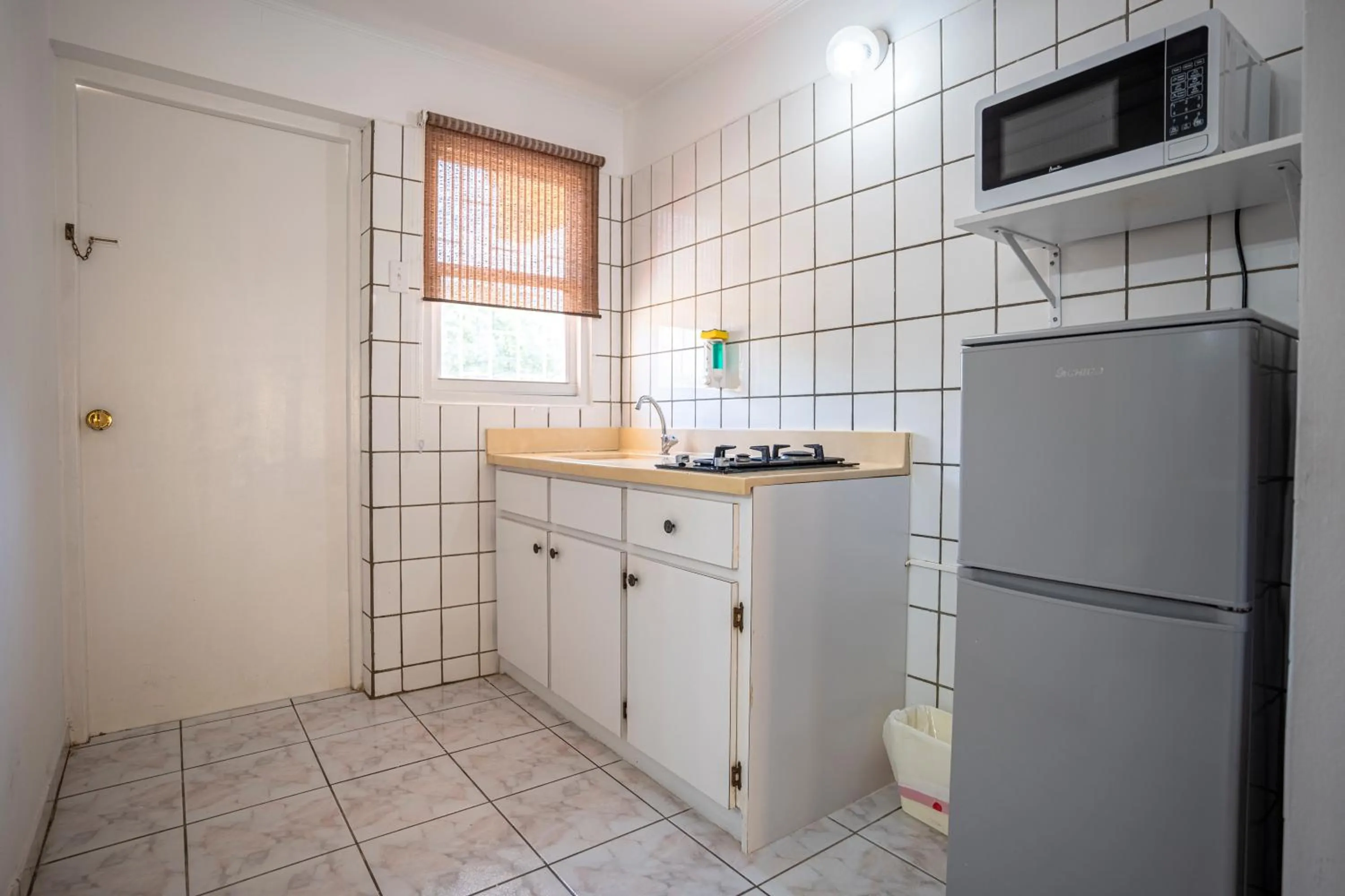 Kitchen or kitchenette in Coconut Inn