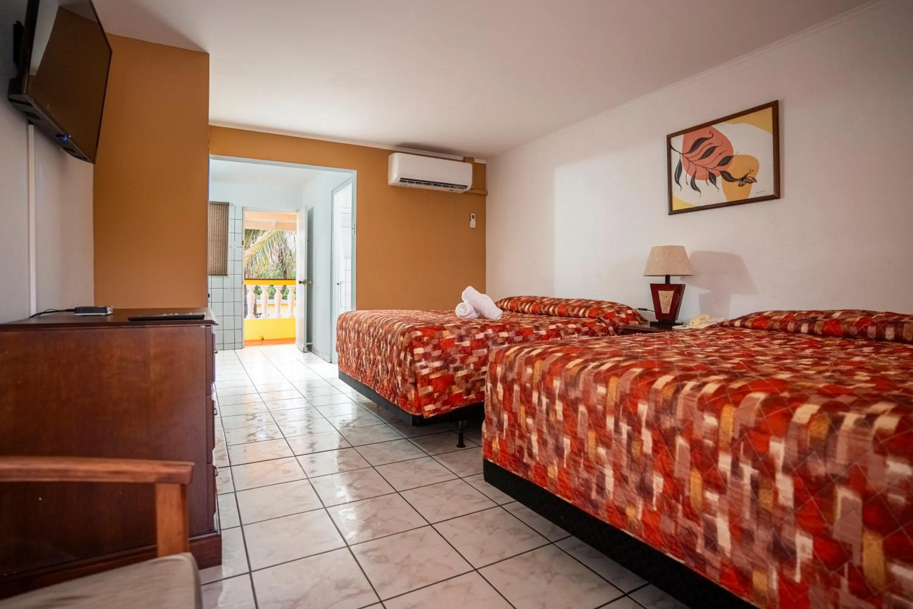 Photo of the whole room, Bed in Coconut Inn