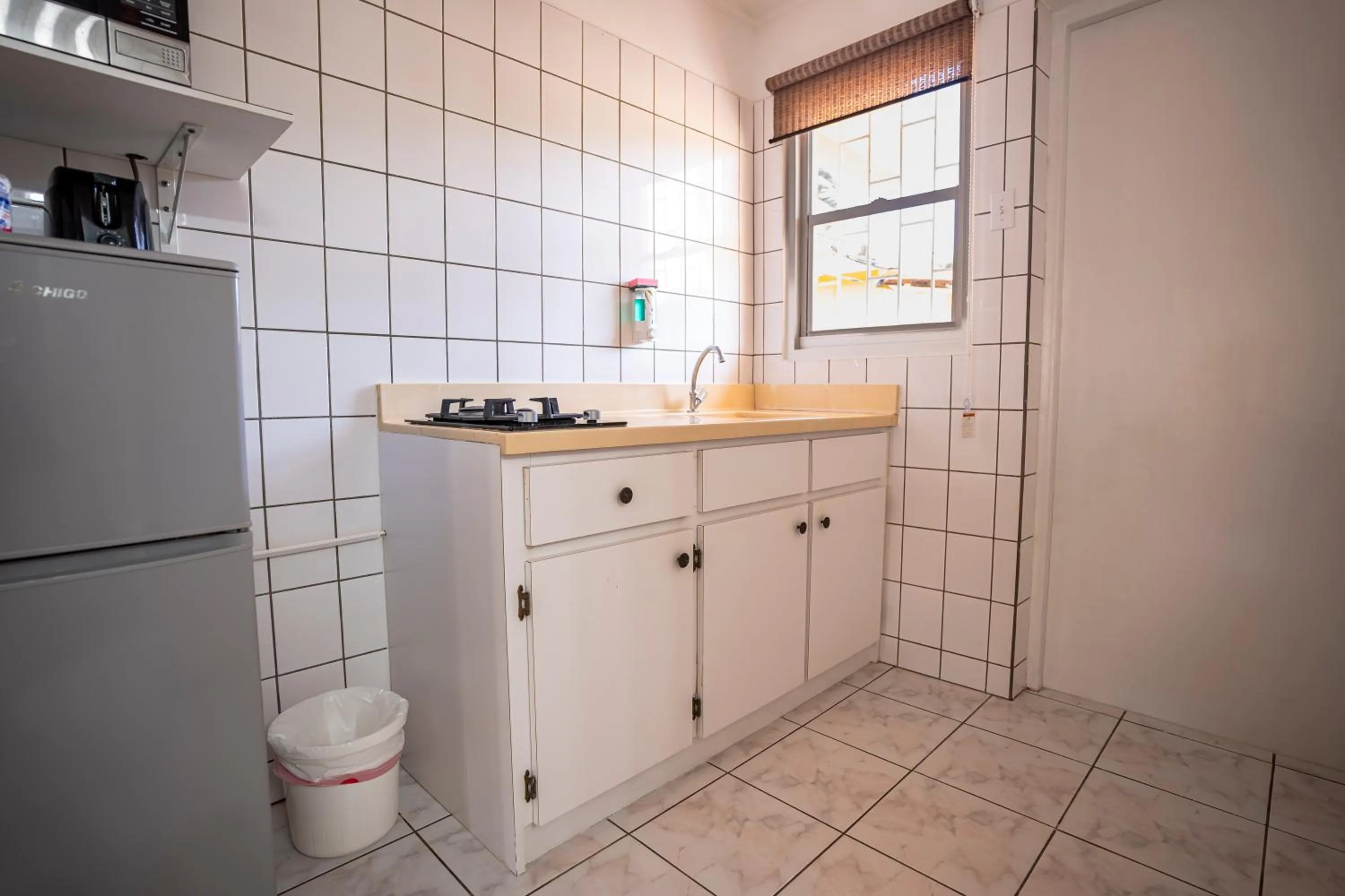 Kitchen or kitchenette in Coconut Inn