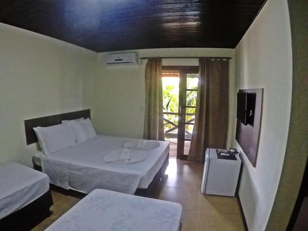 Bed in Pousada Canto Grande