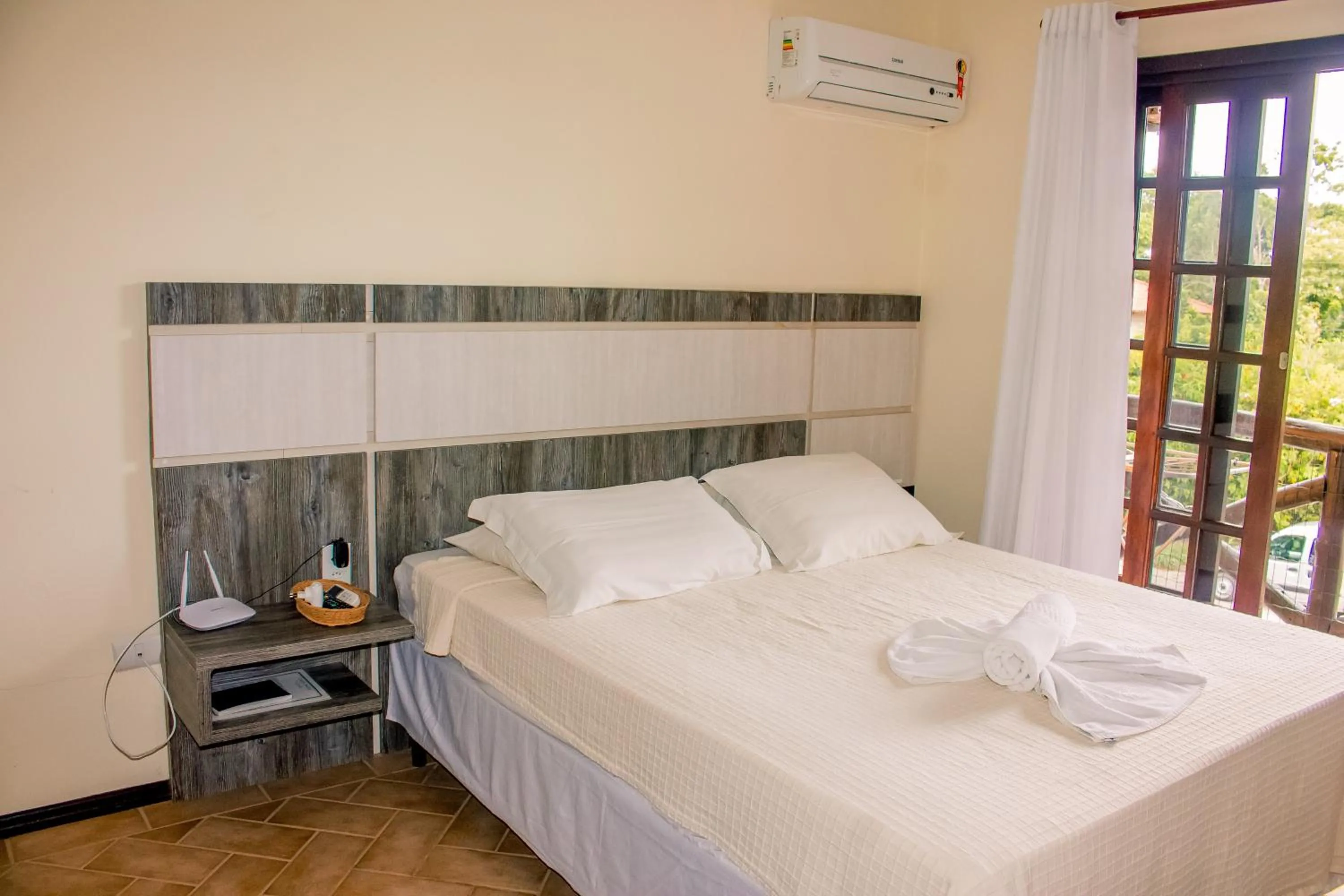 Bed in Pousada Canto Grande