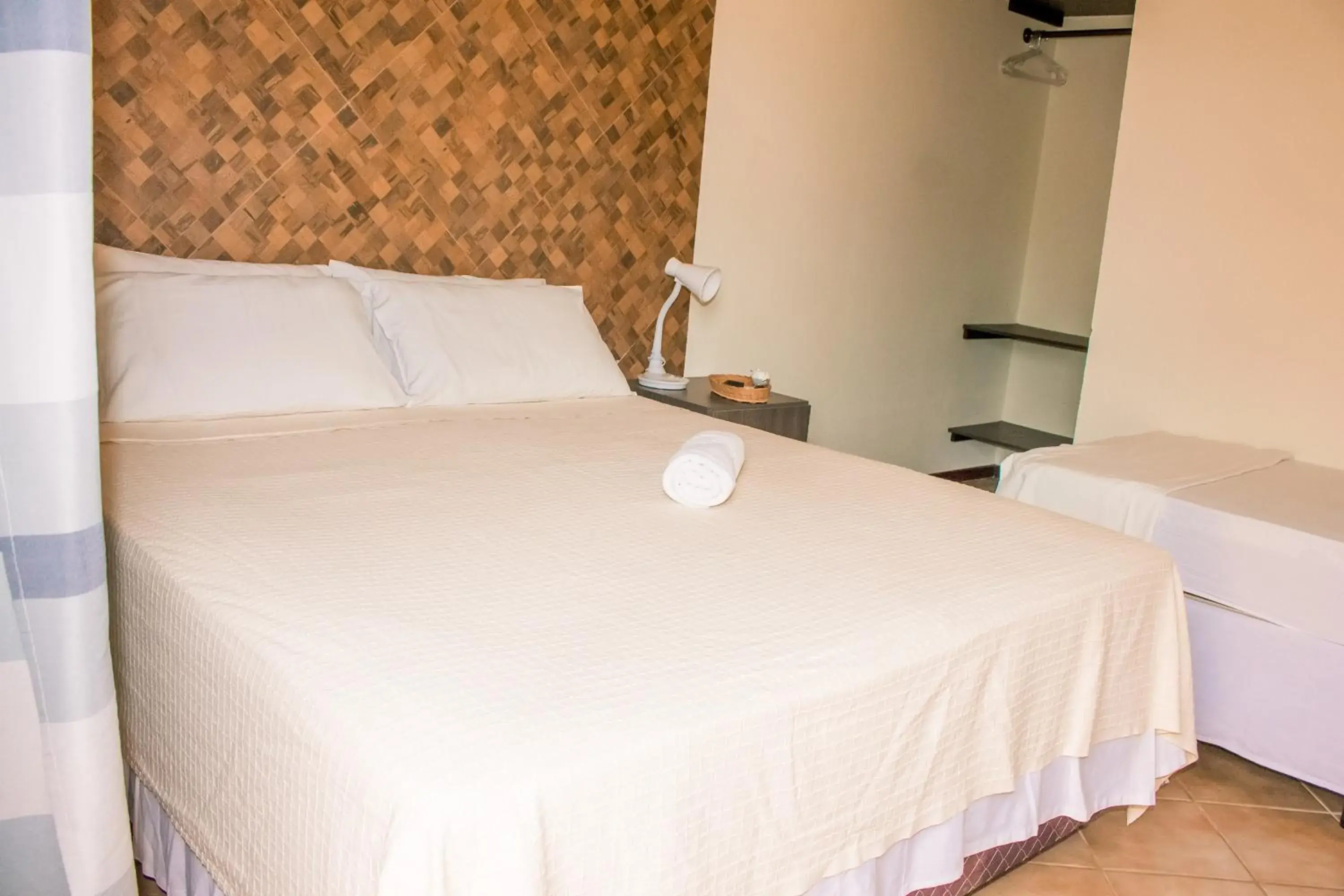 Budget Triple Room in Pousada Canto Grande Budget Triple Room in Pousada Canto Grande