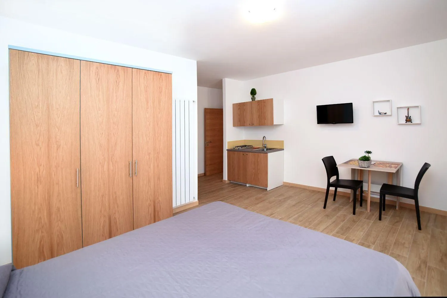 TV and multimedia, Bed in Residenza Montegrappa