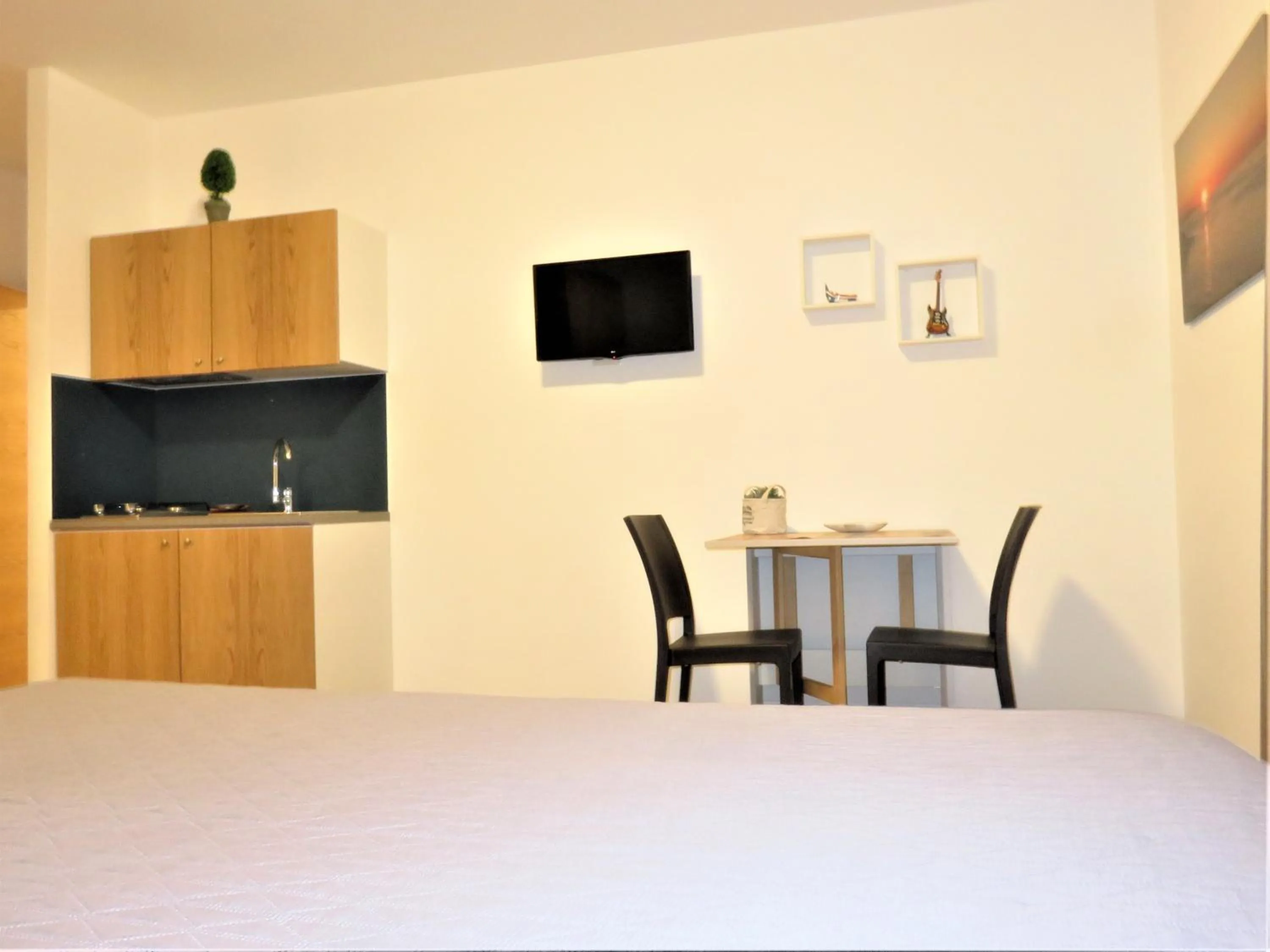 Dining area, Bed in Residenza Montegrappa