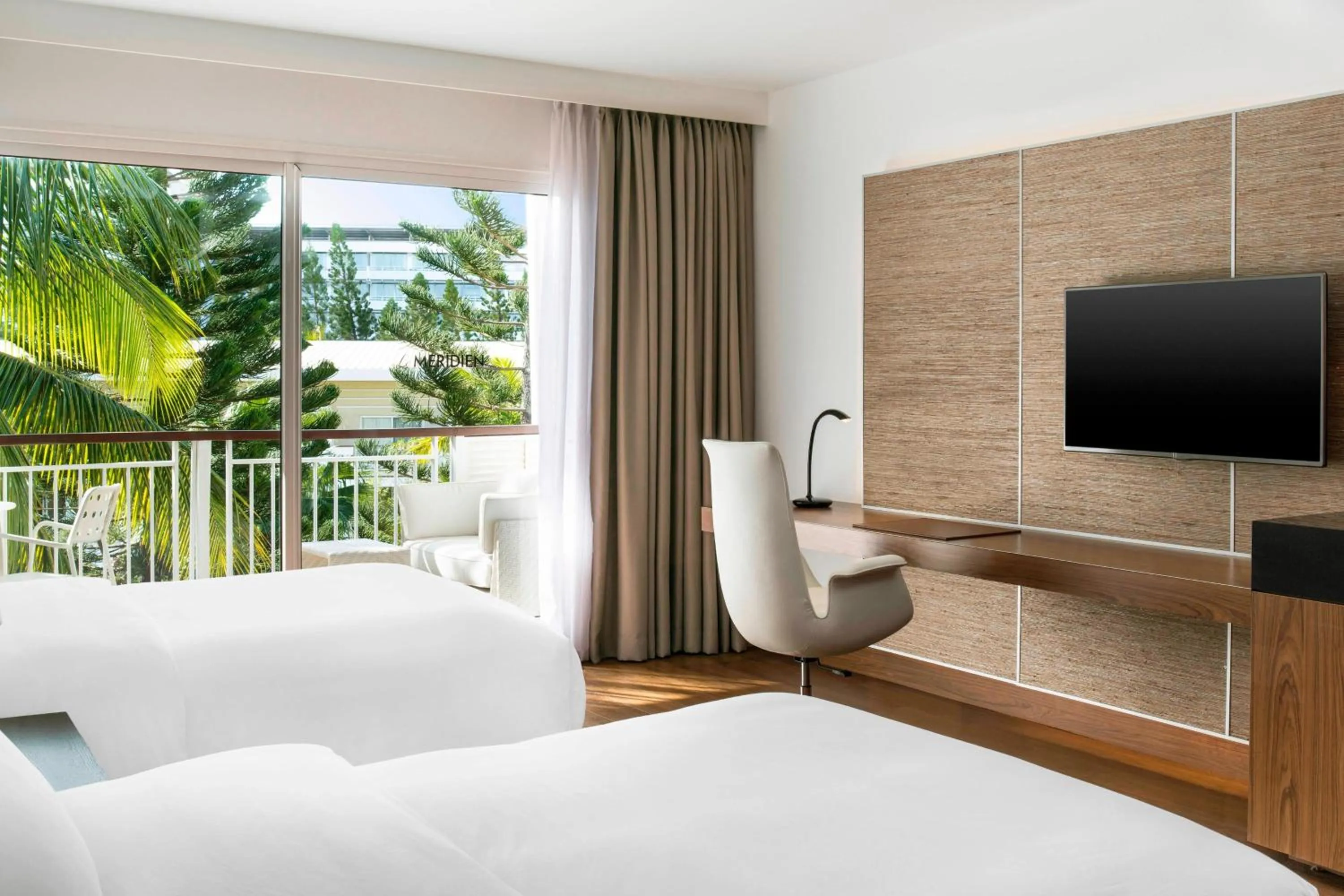 Photo of the whole room, Bed in Le Méridien Nouméa Resort & Spa