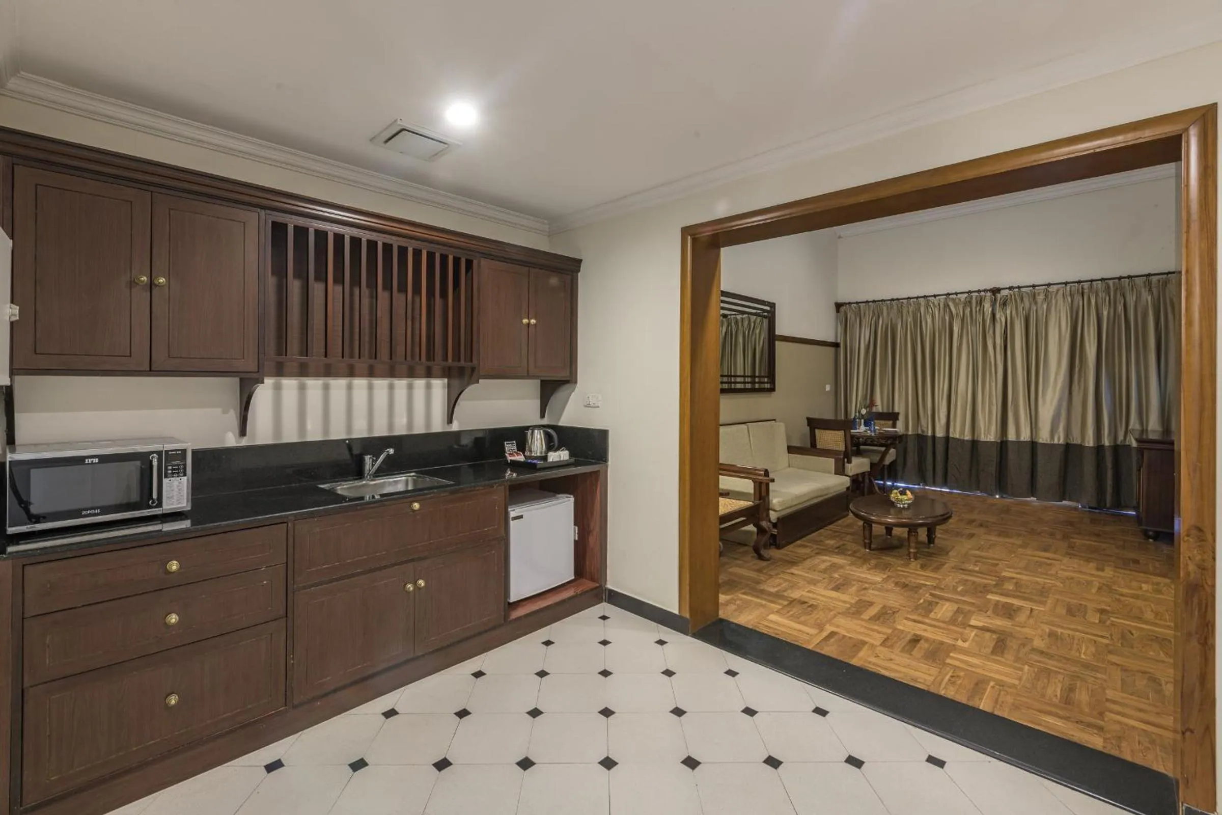 Kitchen or kitchenette in Club Mahindra Lake View Munnar