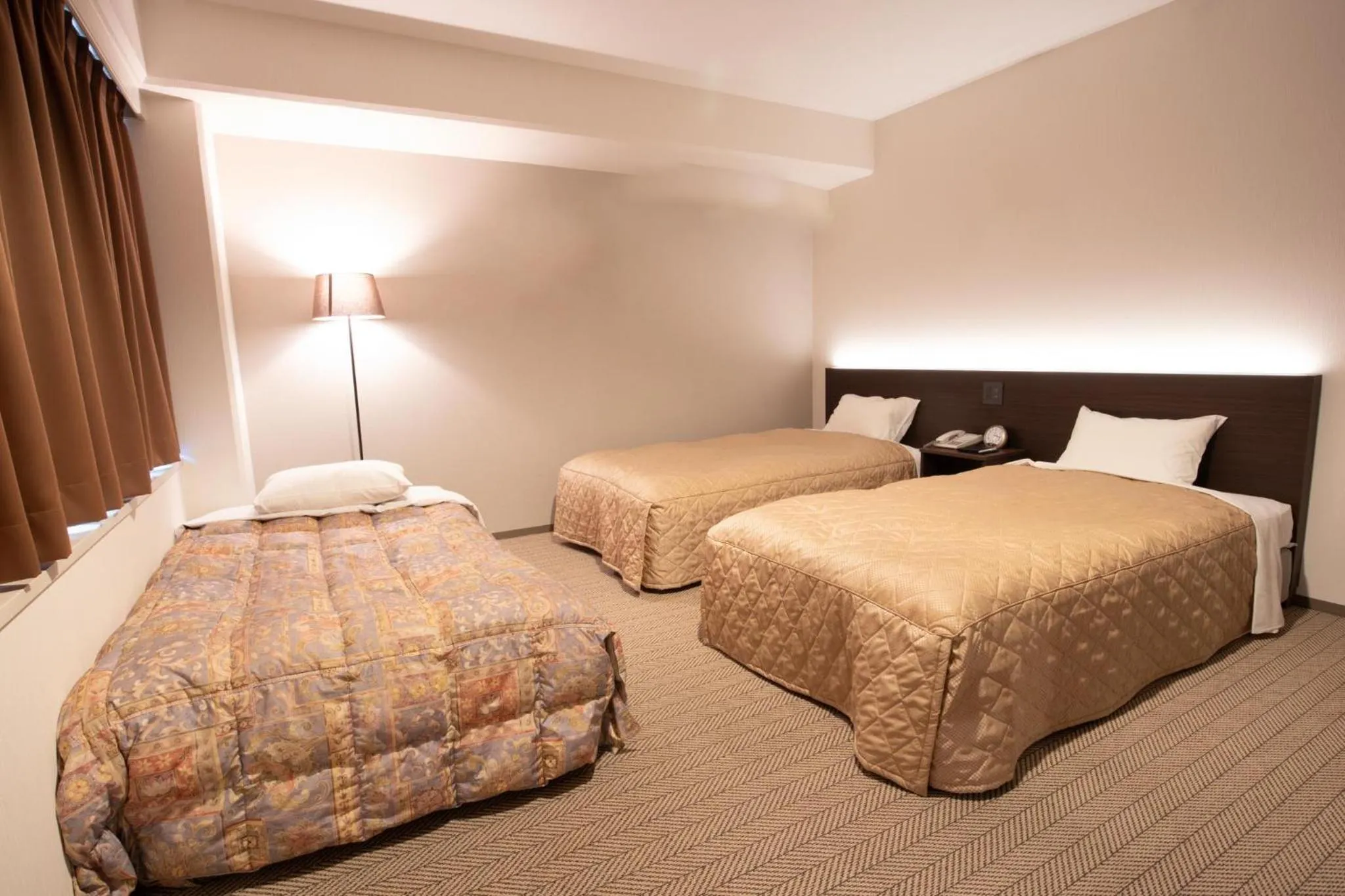 Bed in Hotel Sunroute Matsuyama