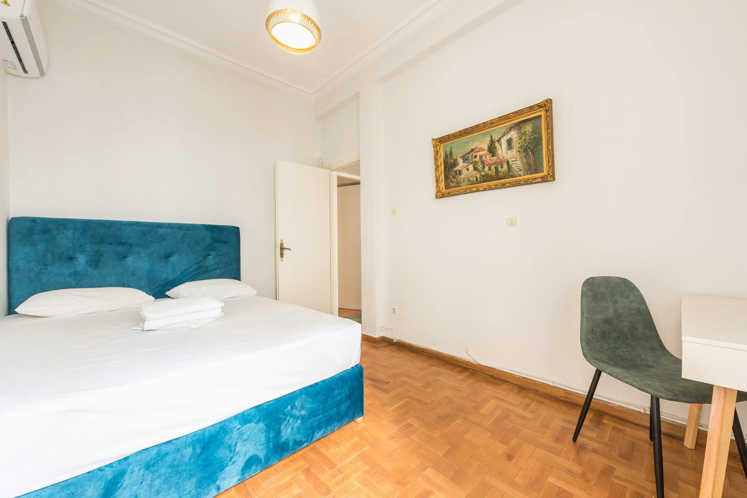 Bed in Athens Empire Paradise Apartment