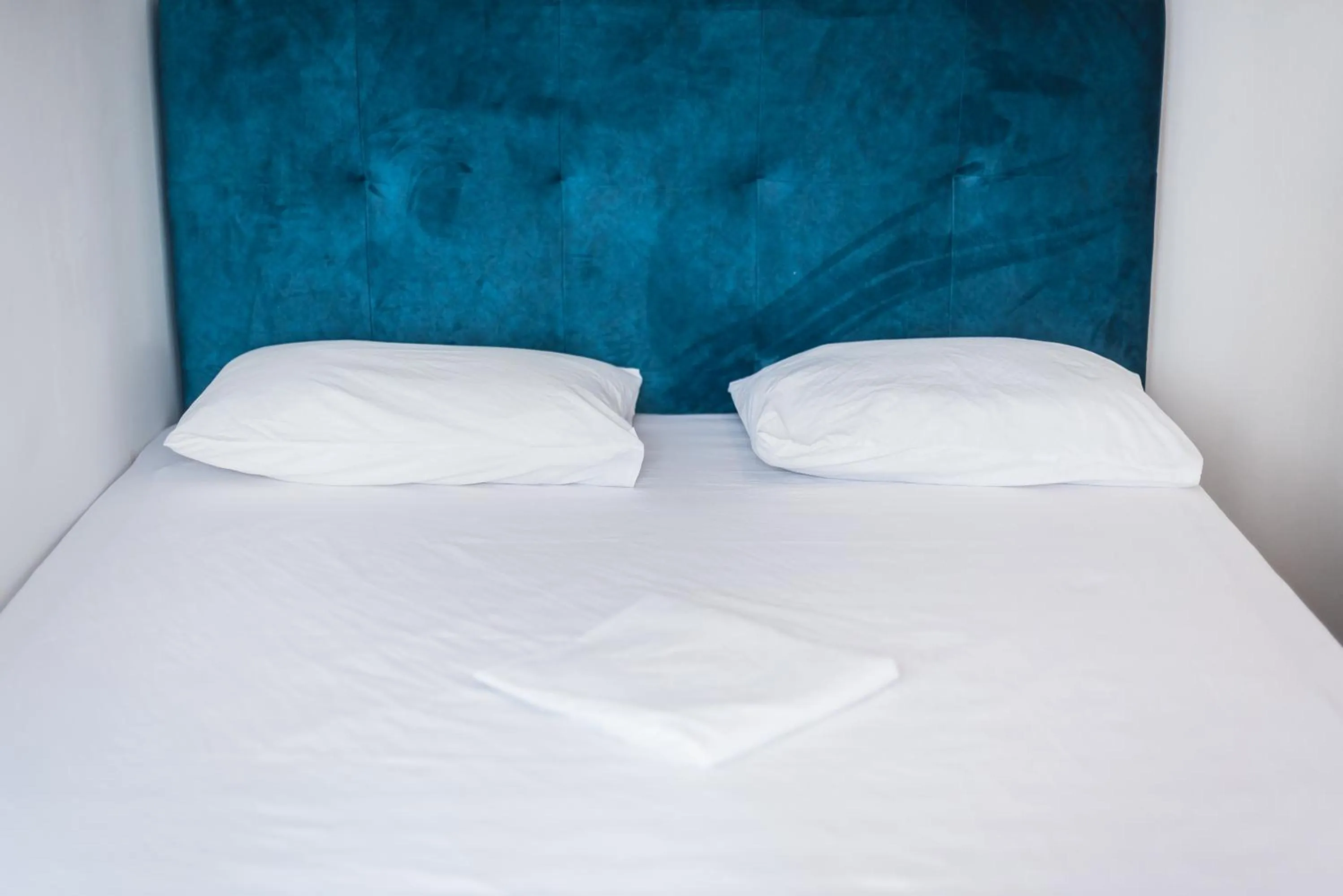 Bed in Athens Empire Paradise Apartment