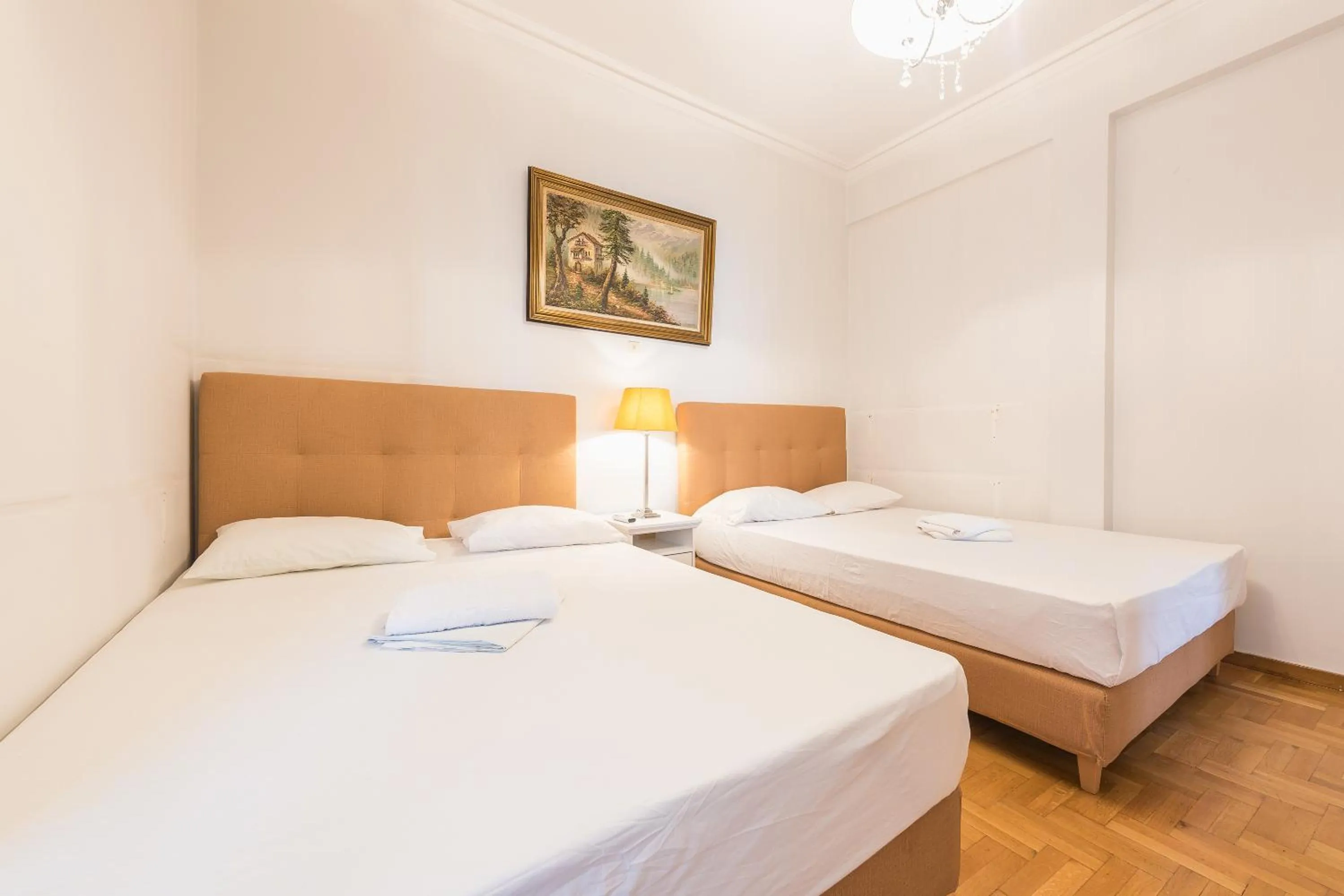 Bed in Athens Empire Paradise Apartment