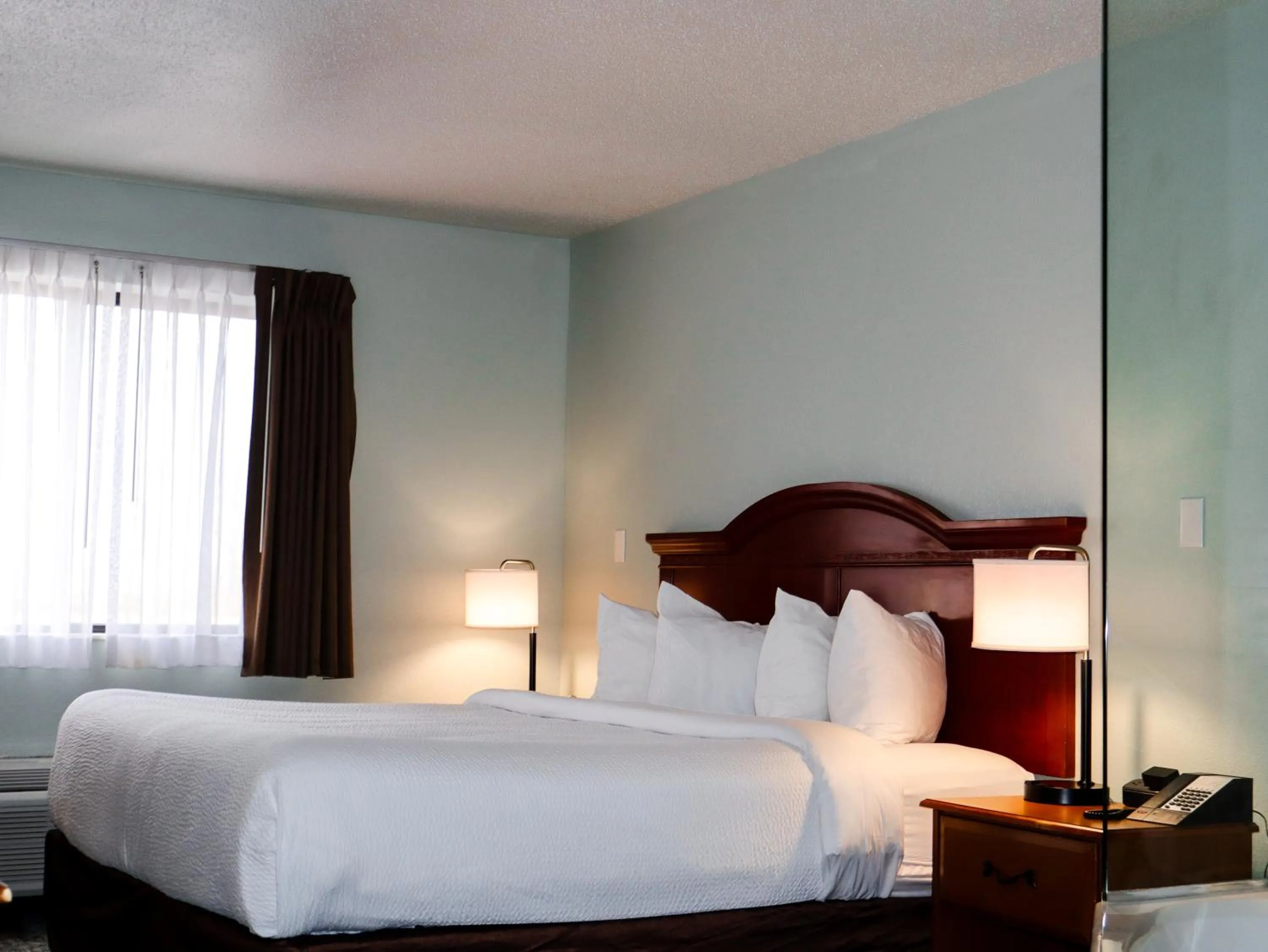 Bed in Travelodge by Wyndham Rapid City - Black Hills