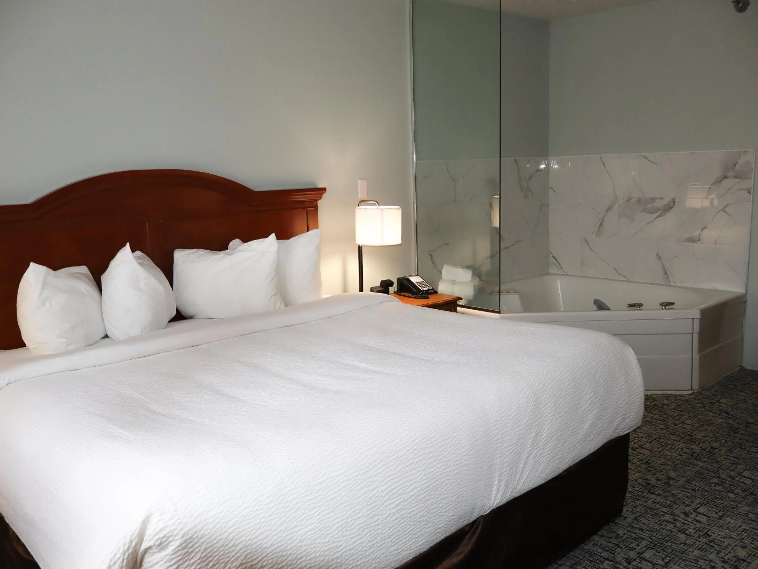 Bed in Travelodge by Wyndham Rapid City - Black Hills