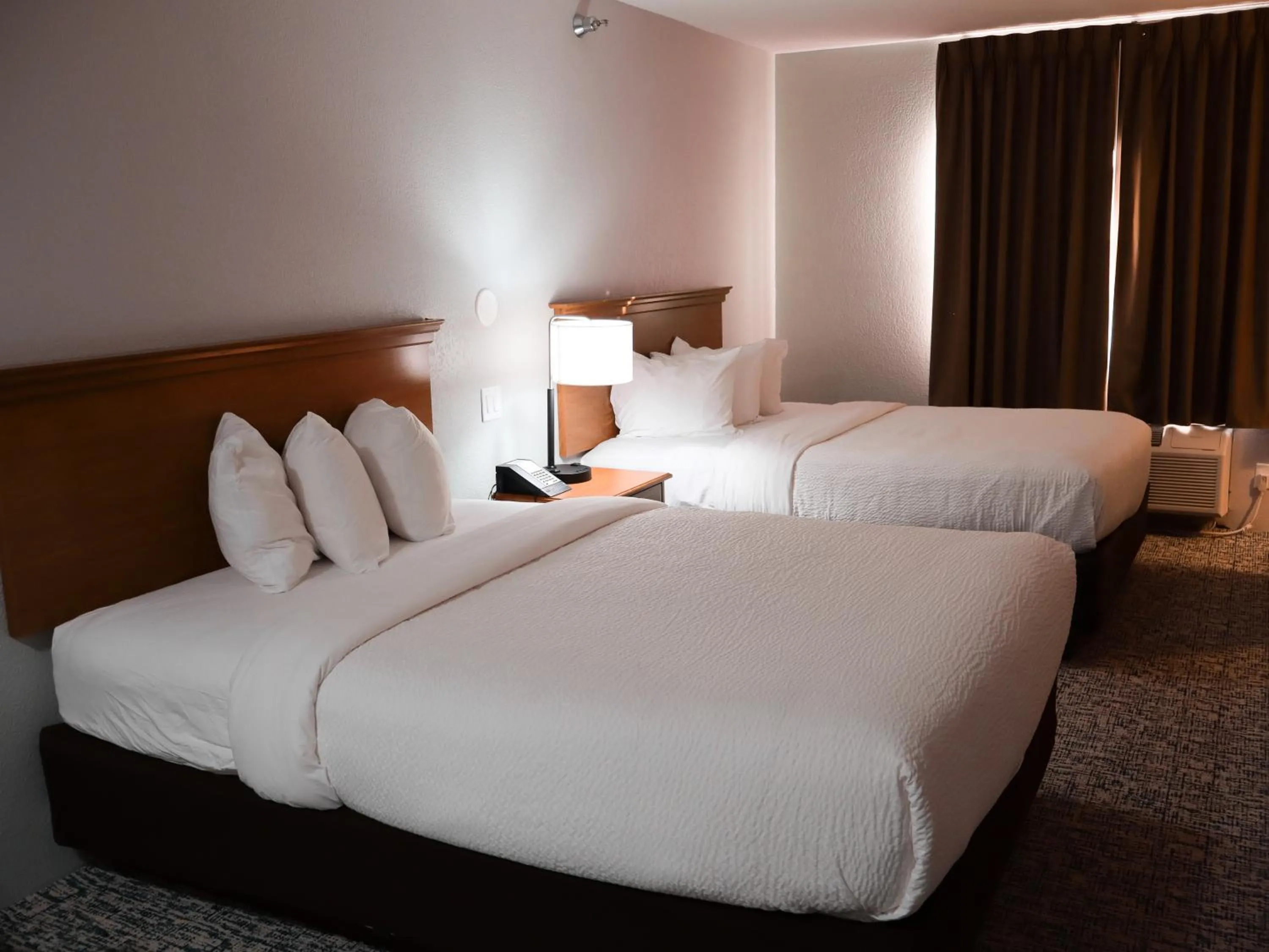 Bed in Travelodge by Wyndham Rapid City - Black Hills