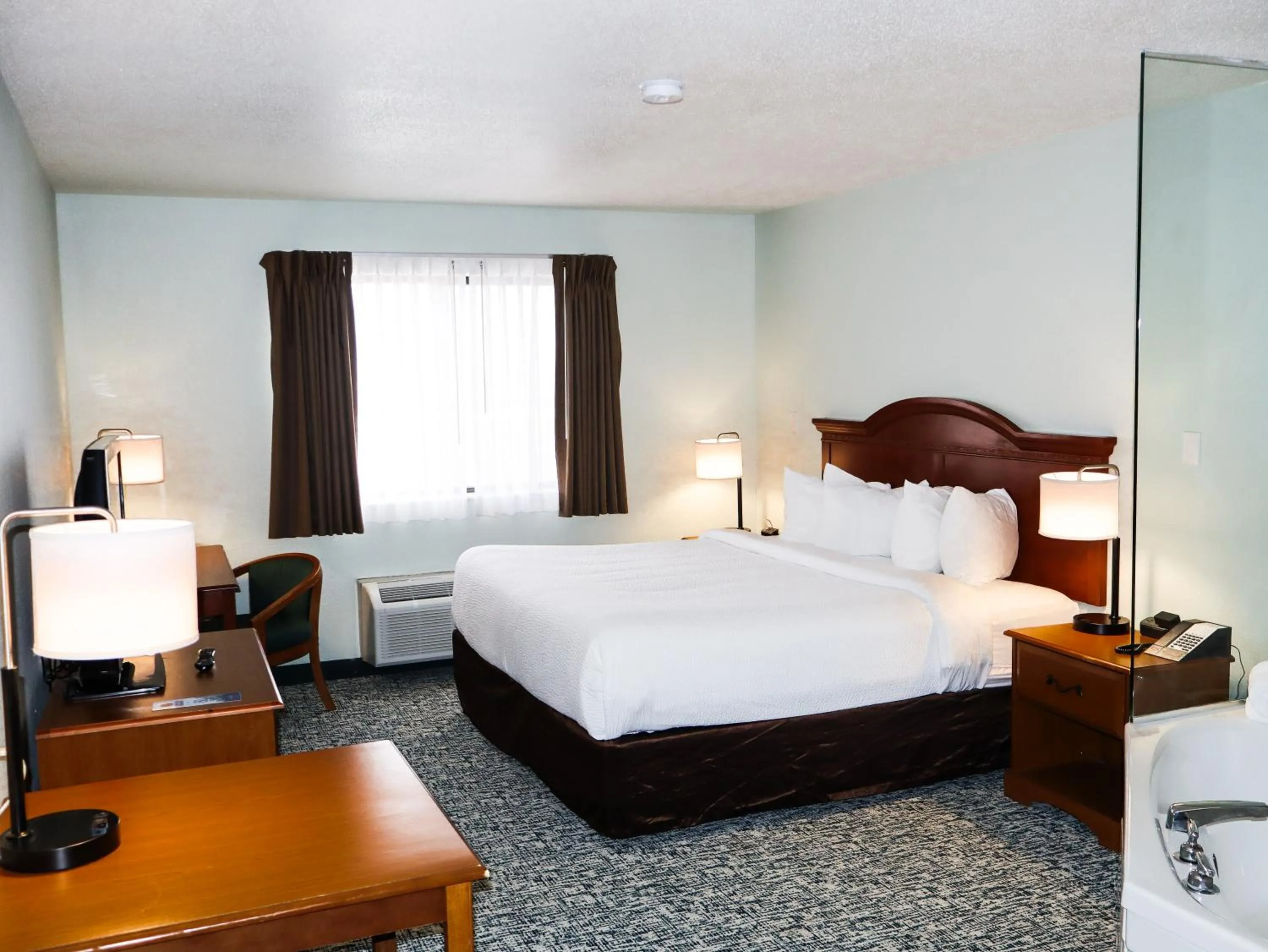 Bed in Travelodge by Wyndham Rapid City - Black Hills