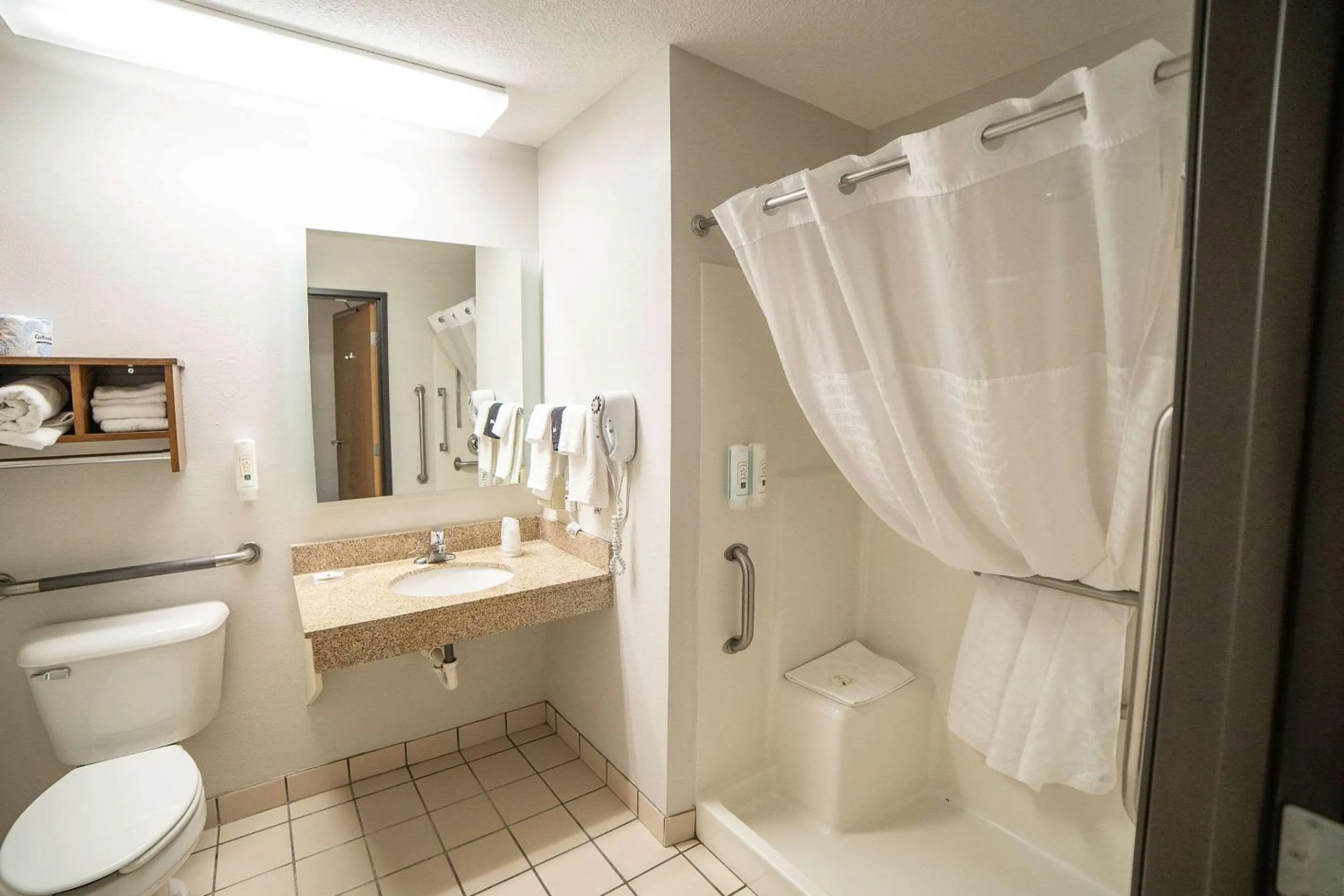 Bedroom in Quality Inn & Suites Watertown near Prairie Lakes Ice Arena