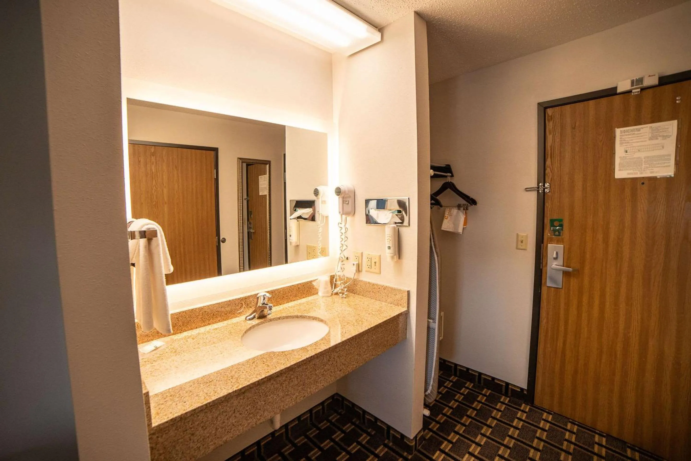 Bedroom in Quality Inn & Suites Watertown near Prairie Lakes Ice Arena