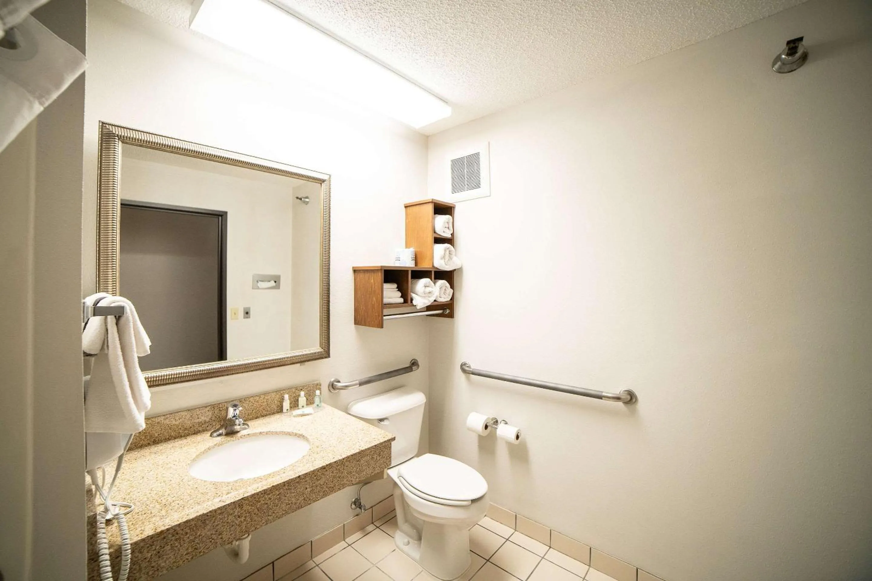 Bedroom in Quality Inn & Suites Watertown near Prairie Lakes Ice Arena