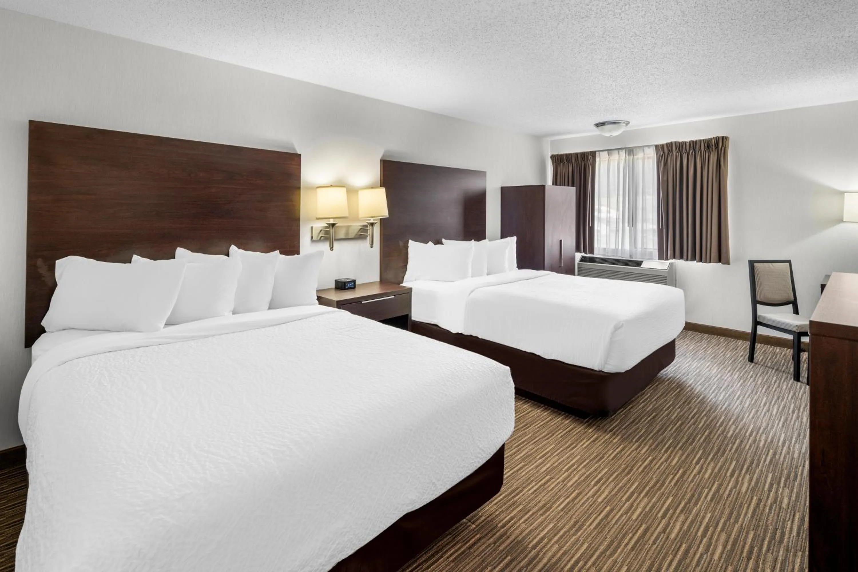 Bedroom, Bed in EverSpring Inn & Suites