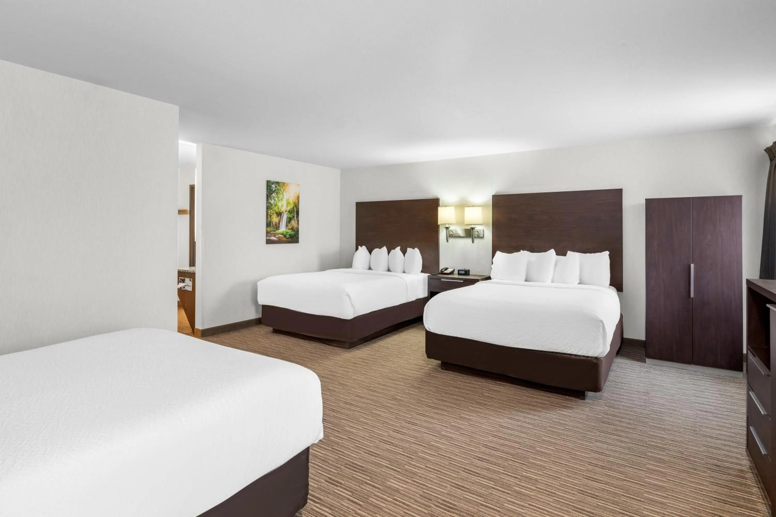 Bedroom, Bed in EverSpring Inn & Suites