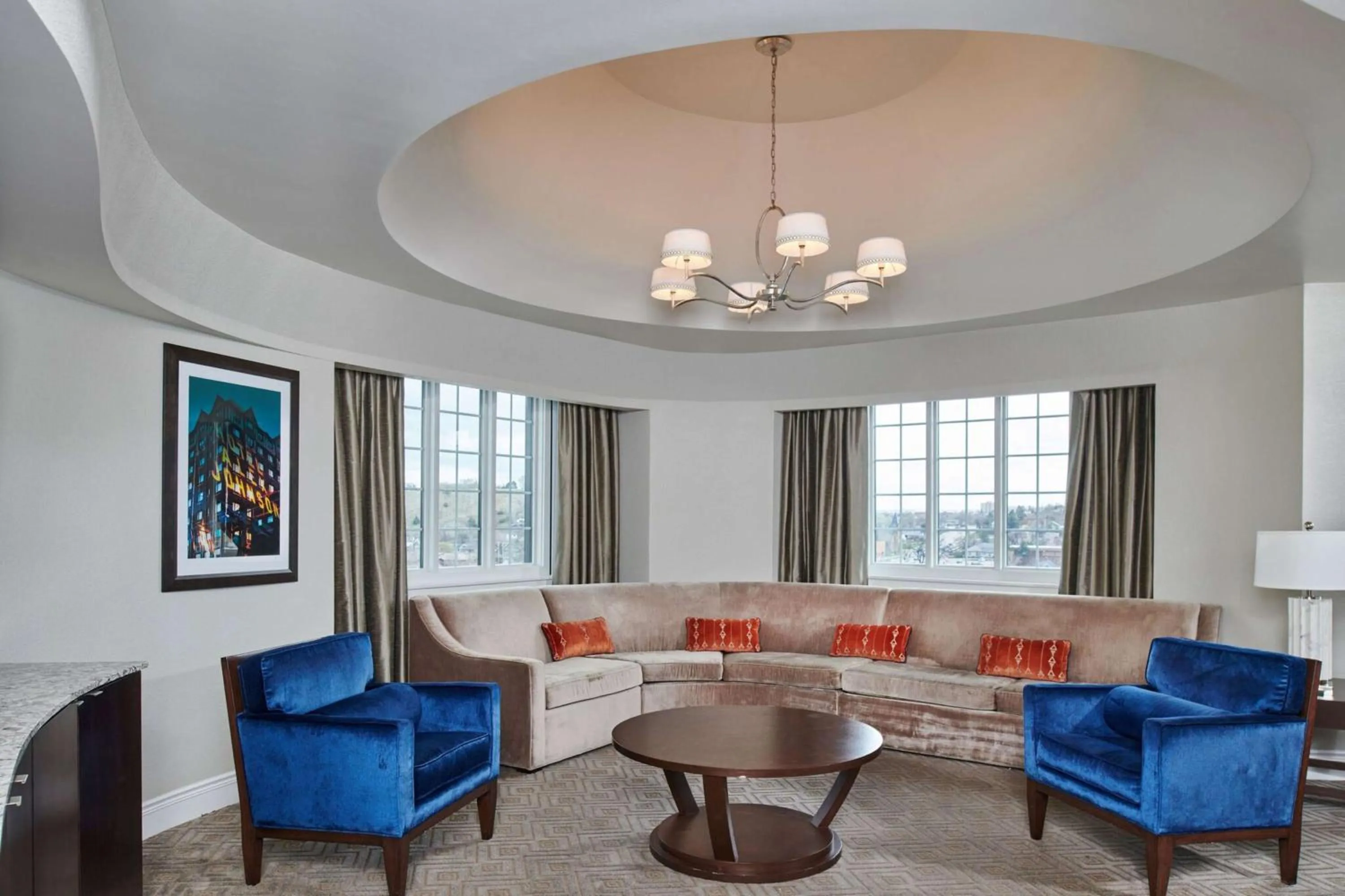 Living room in Hotel Alex Johnson Rapid City, Curio Collection by Hilton