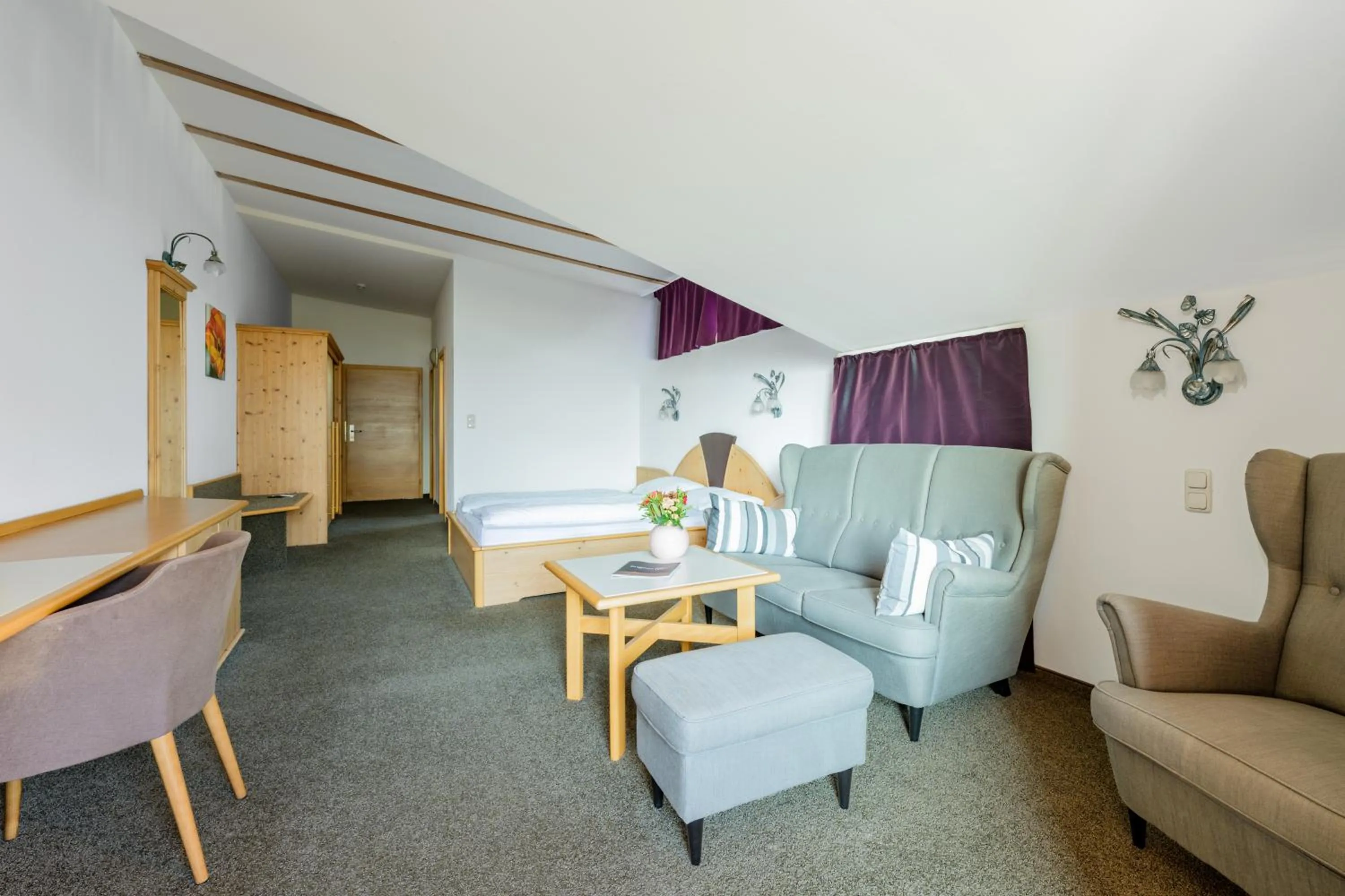 Seating area in Landgasthof Bogner by SMK Event und Gastro