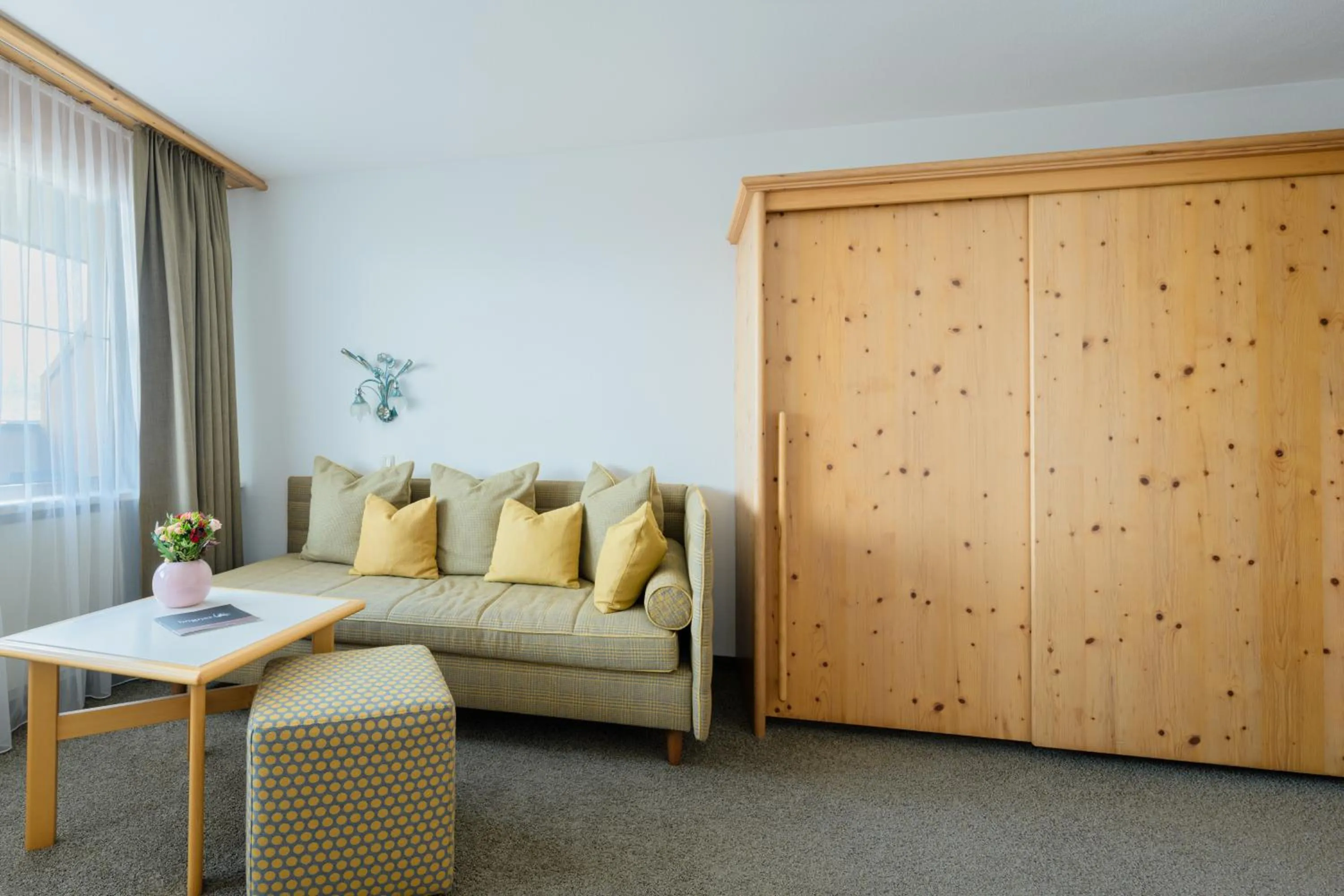 Seating area in Landgasthof Bogner by SMK Event und Gastro