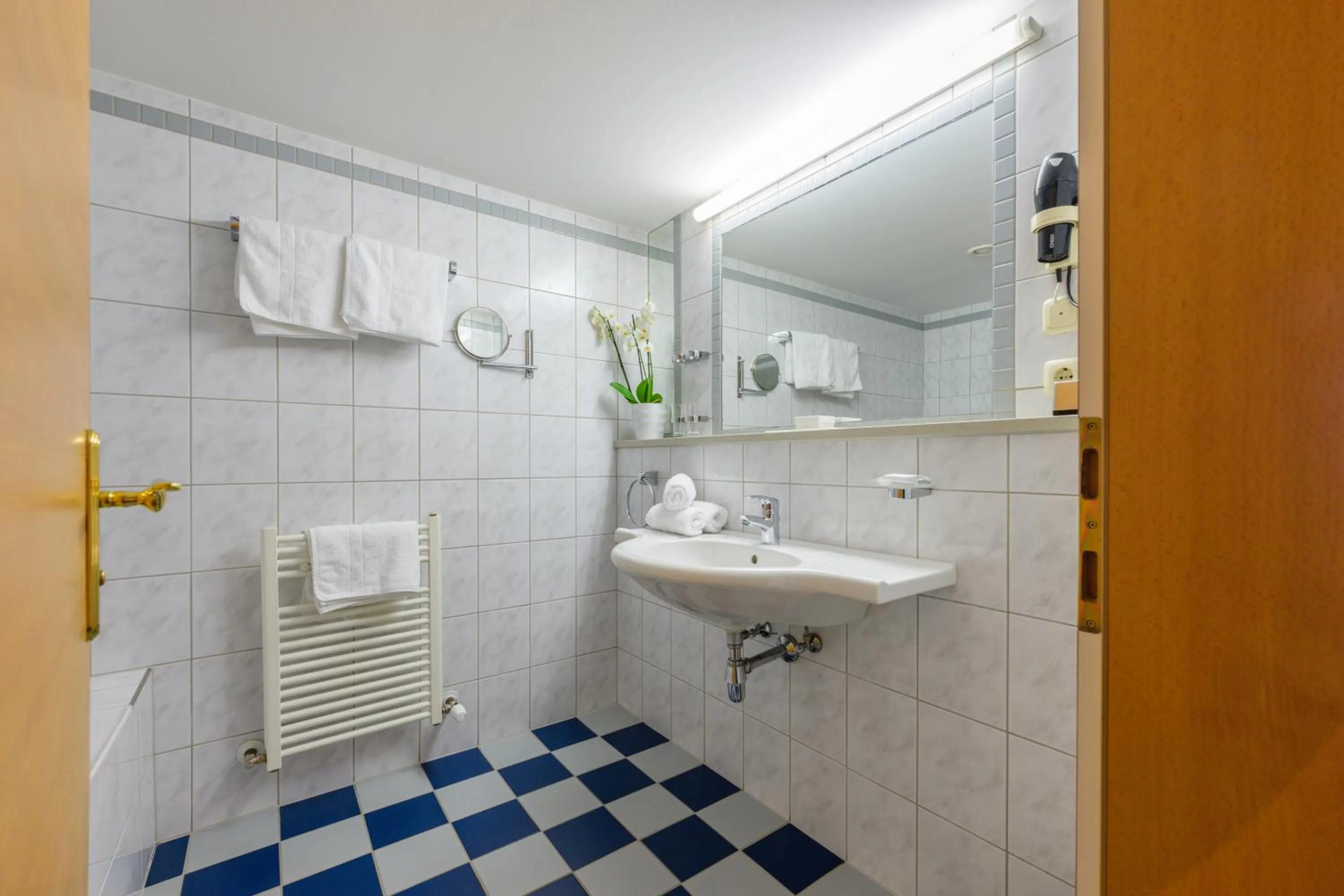 Bathroom in Landgasthof Bogner by SMK Event und Gastro