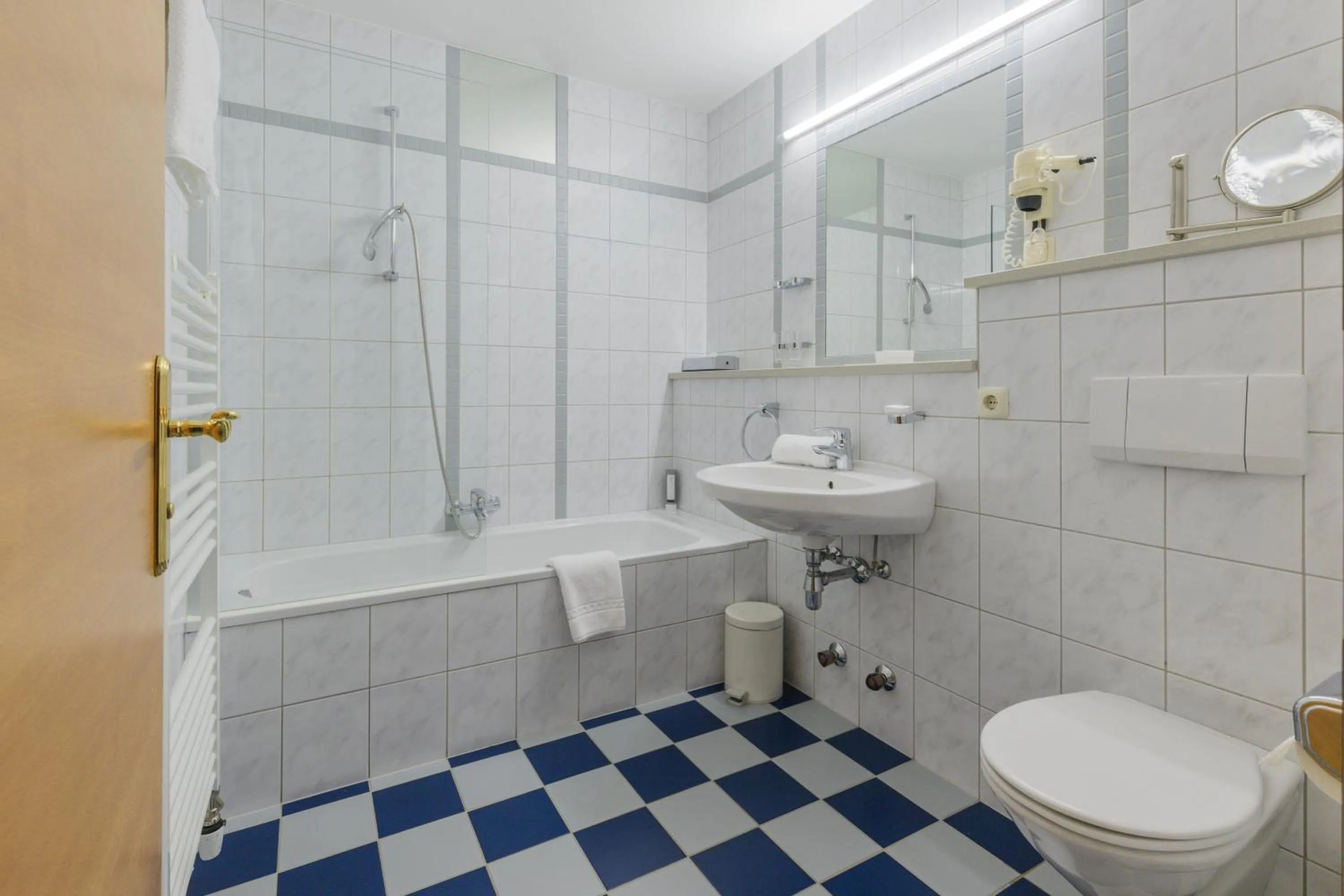 Bathroom in Landgasthof Bogner by SMK Event und Gastro