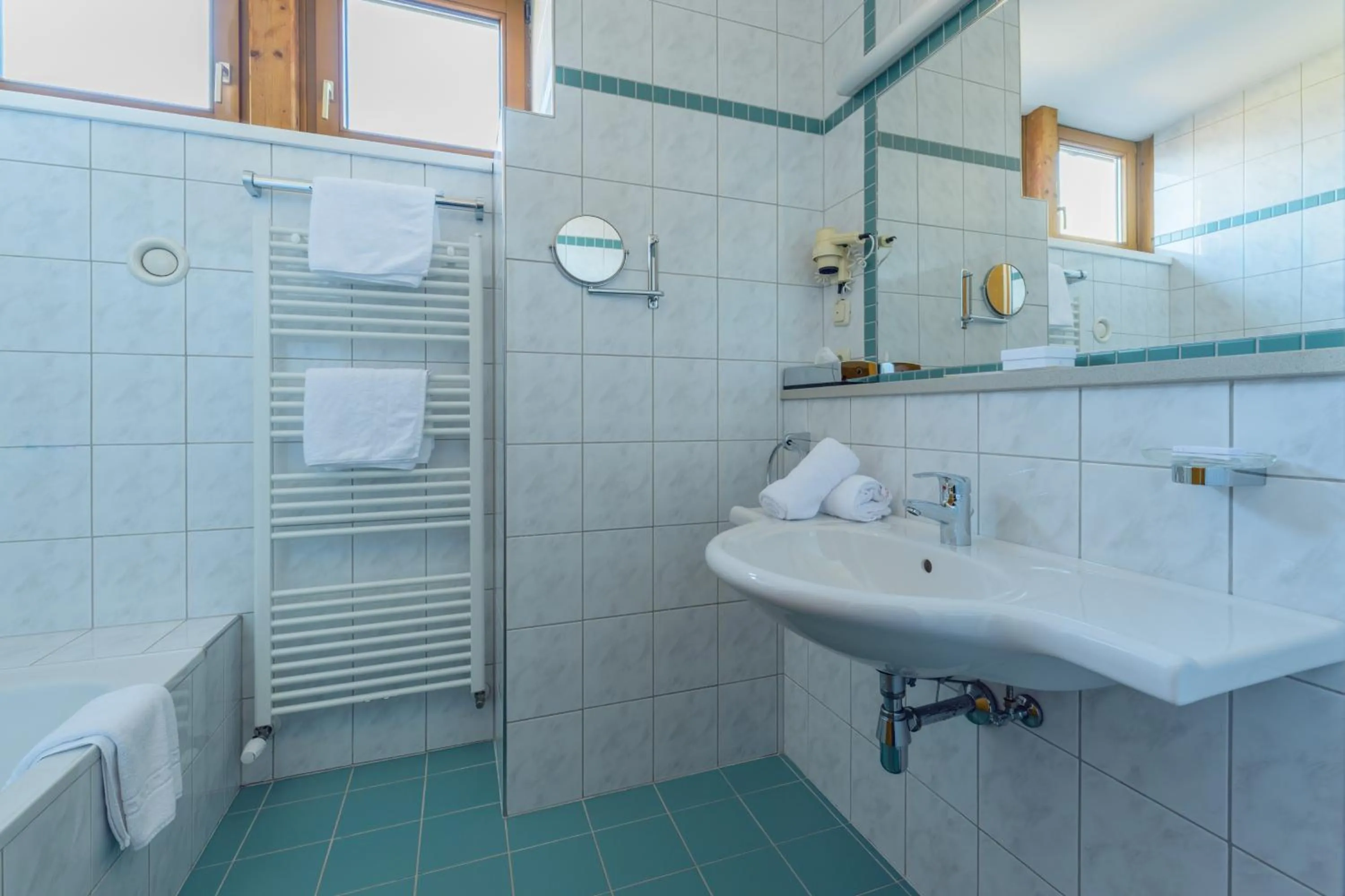 Bathroom in Landgasthof Bogner by SMK Event und Gastro