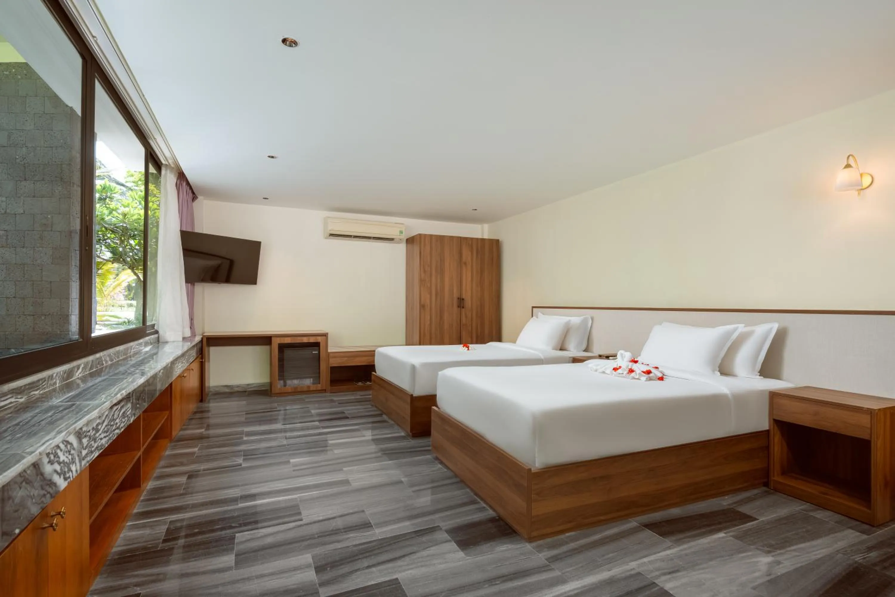 Photo of the whole room, Bed in CocoLand Thu Xa Ancient Town Hotel & Resort