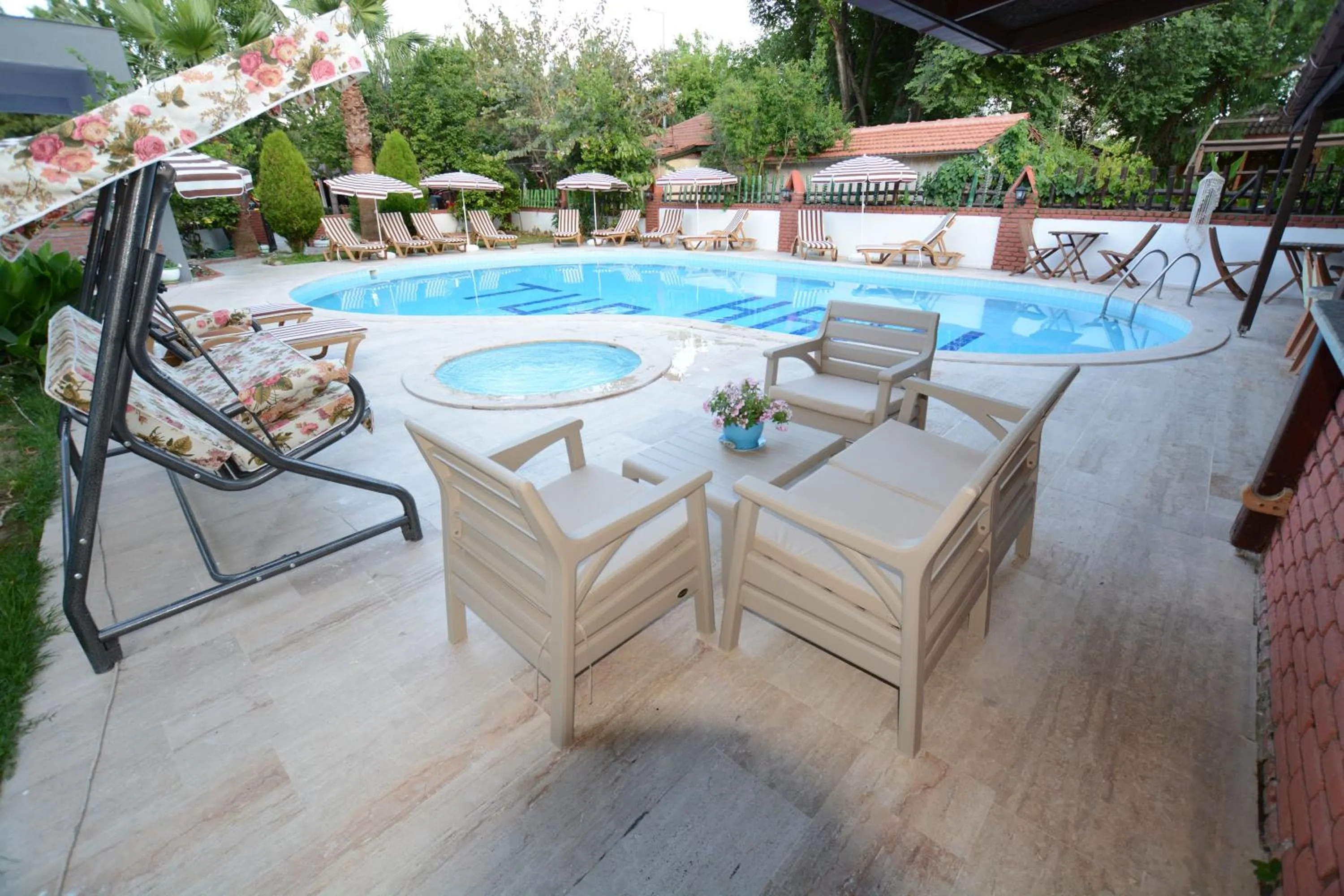 Garden, Swimming Pool in YENI DOGA HOTEL