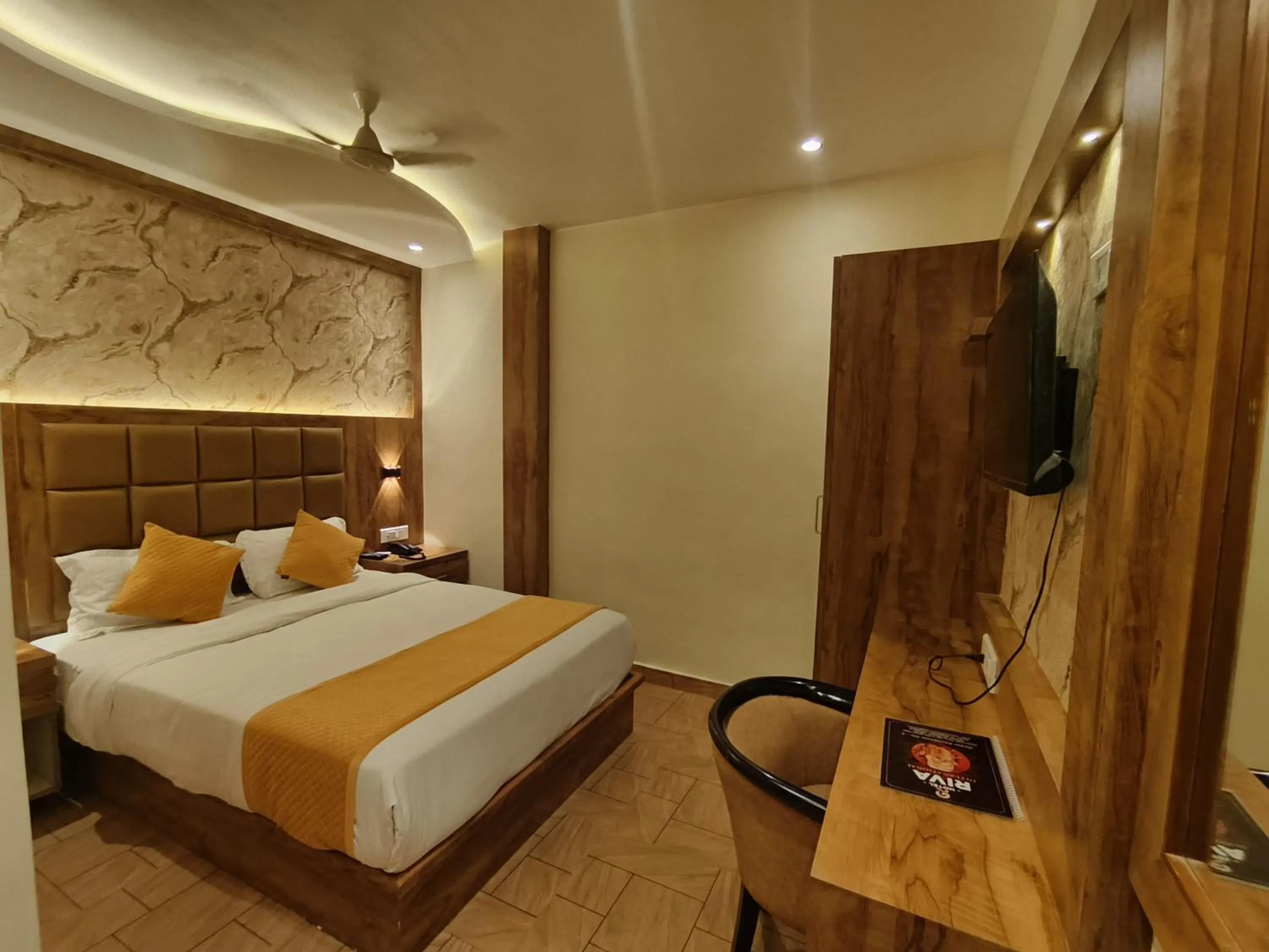 Bed in Hotel Riva International Goregaon- Near NESCO