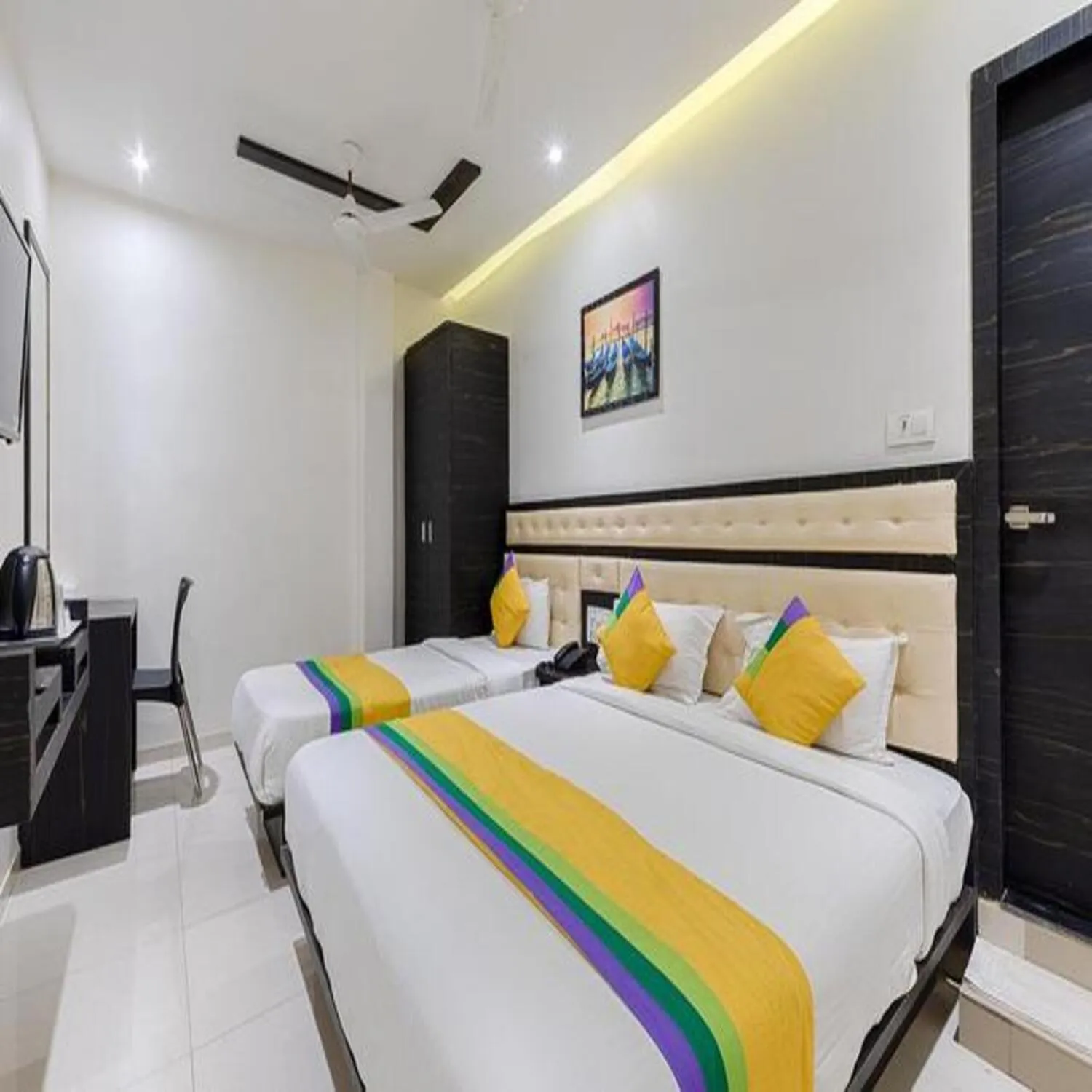 Bed in Hotel Riva International Goregaon- Near NESCO